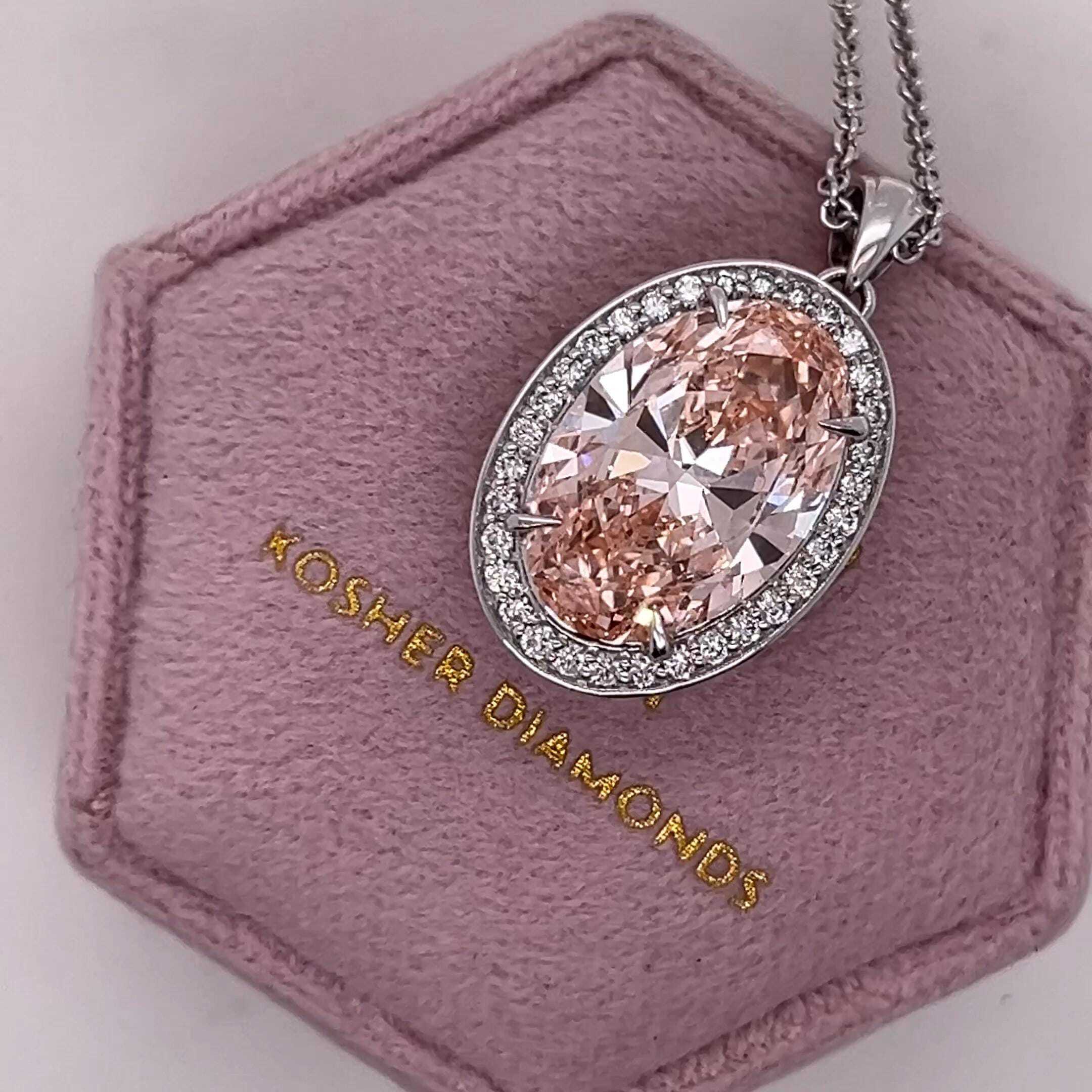 7.25 Carat Fancy Vivid Pink Color Oval Cut Diamond Halo Pendant