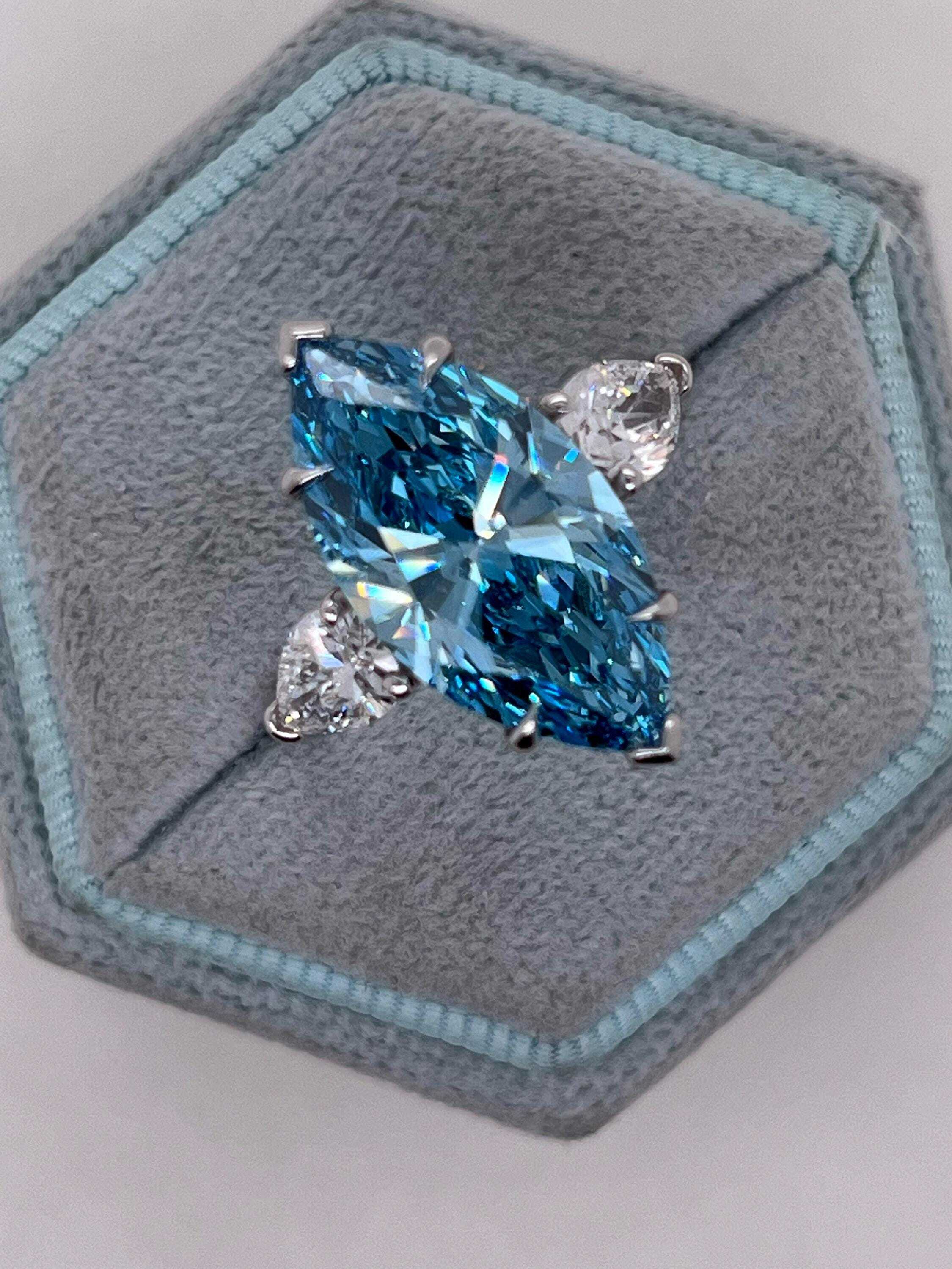 7 Carat Fancy Vivid Blue Color Marquise Three Stone Engagement Ring Side Pear Diamonds