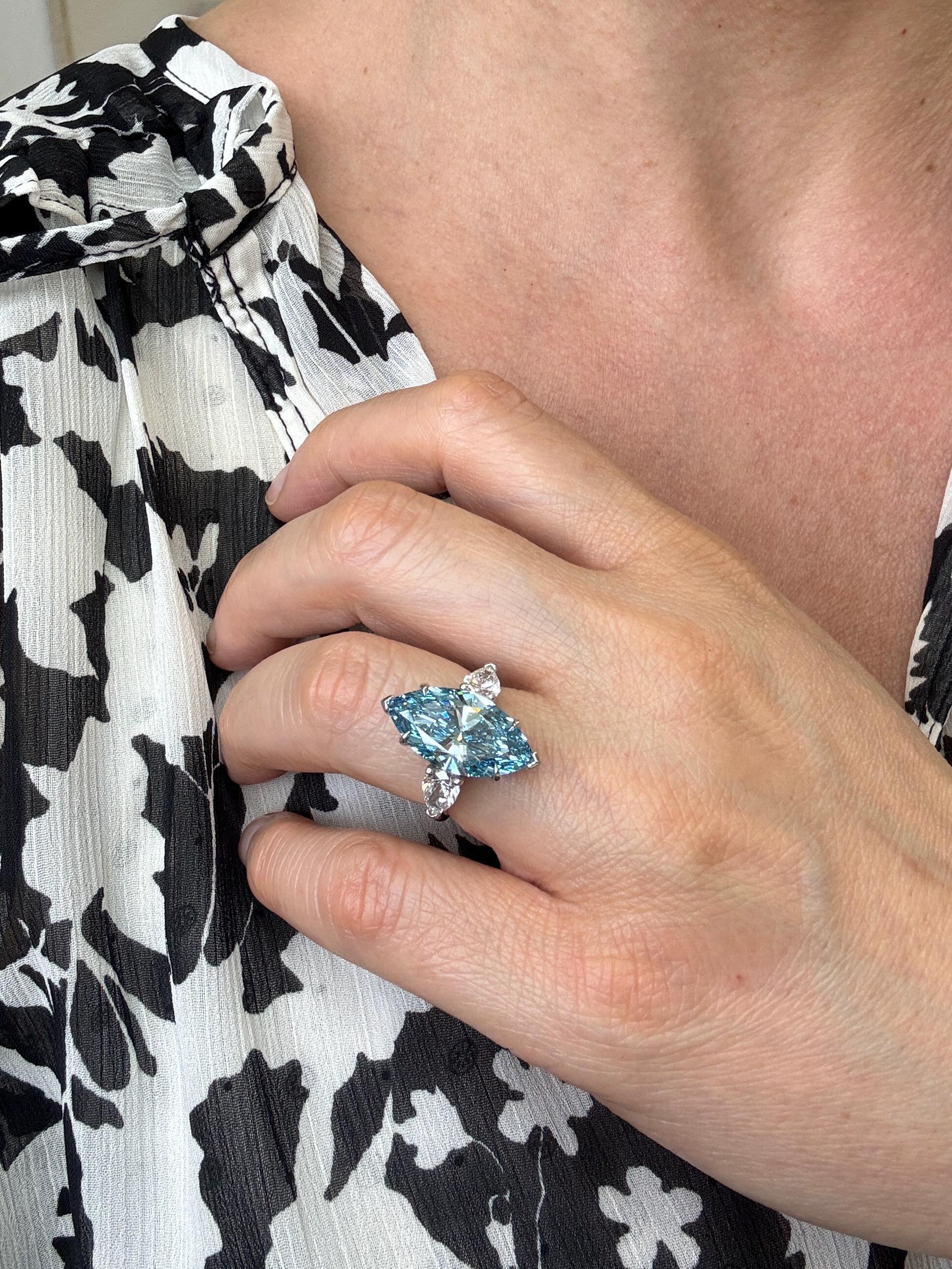 7 Carat Fancy Vivid Blue Color Marquise Three Stone Engagement Ring Side Pear Diamonds