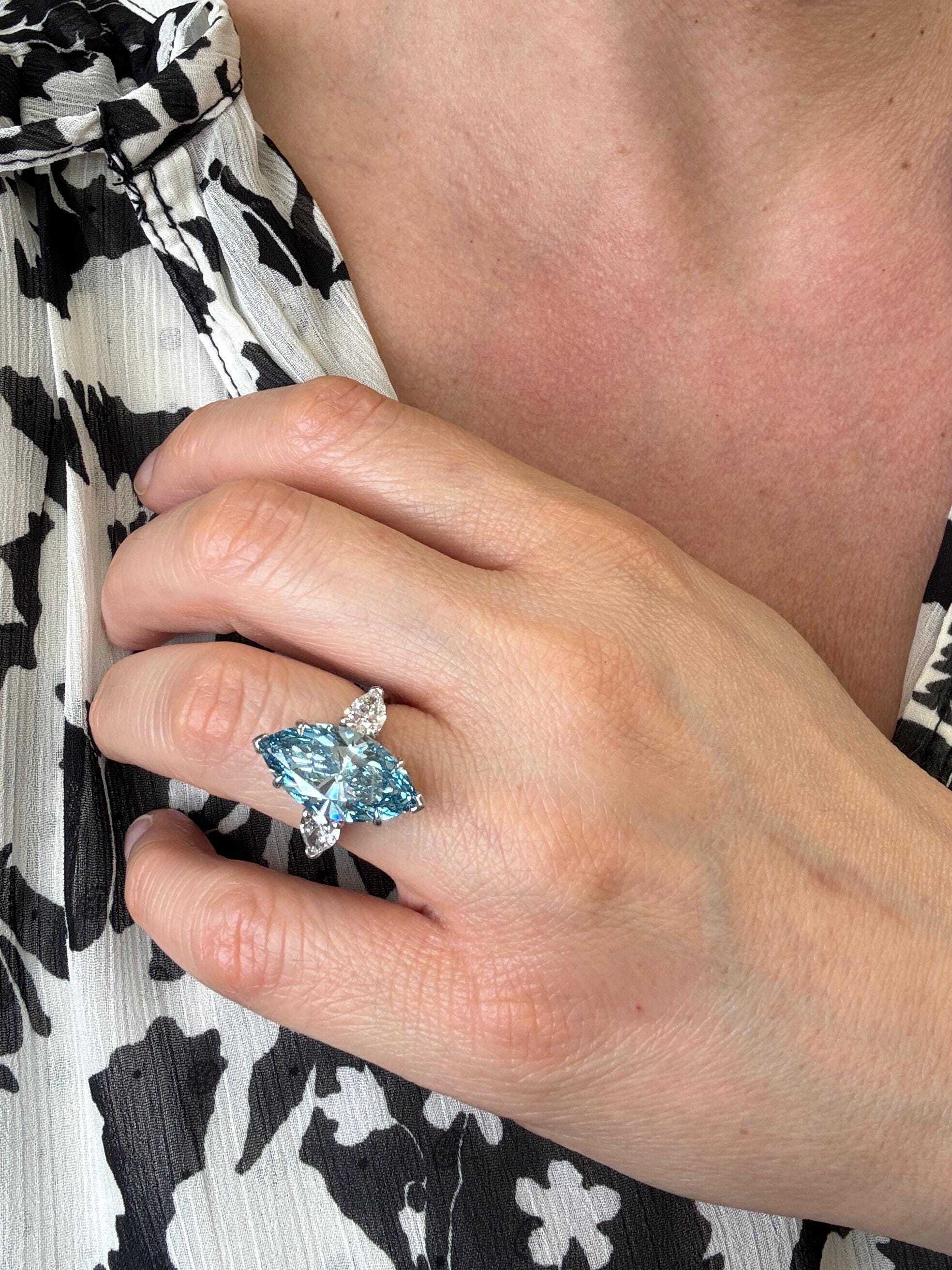 7 Carat Fancy Vivid Blue Color Marquise Three Stone Engagement Ring Side Pear Diamonds