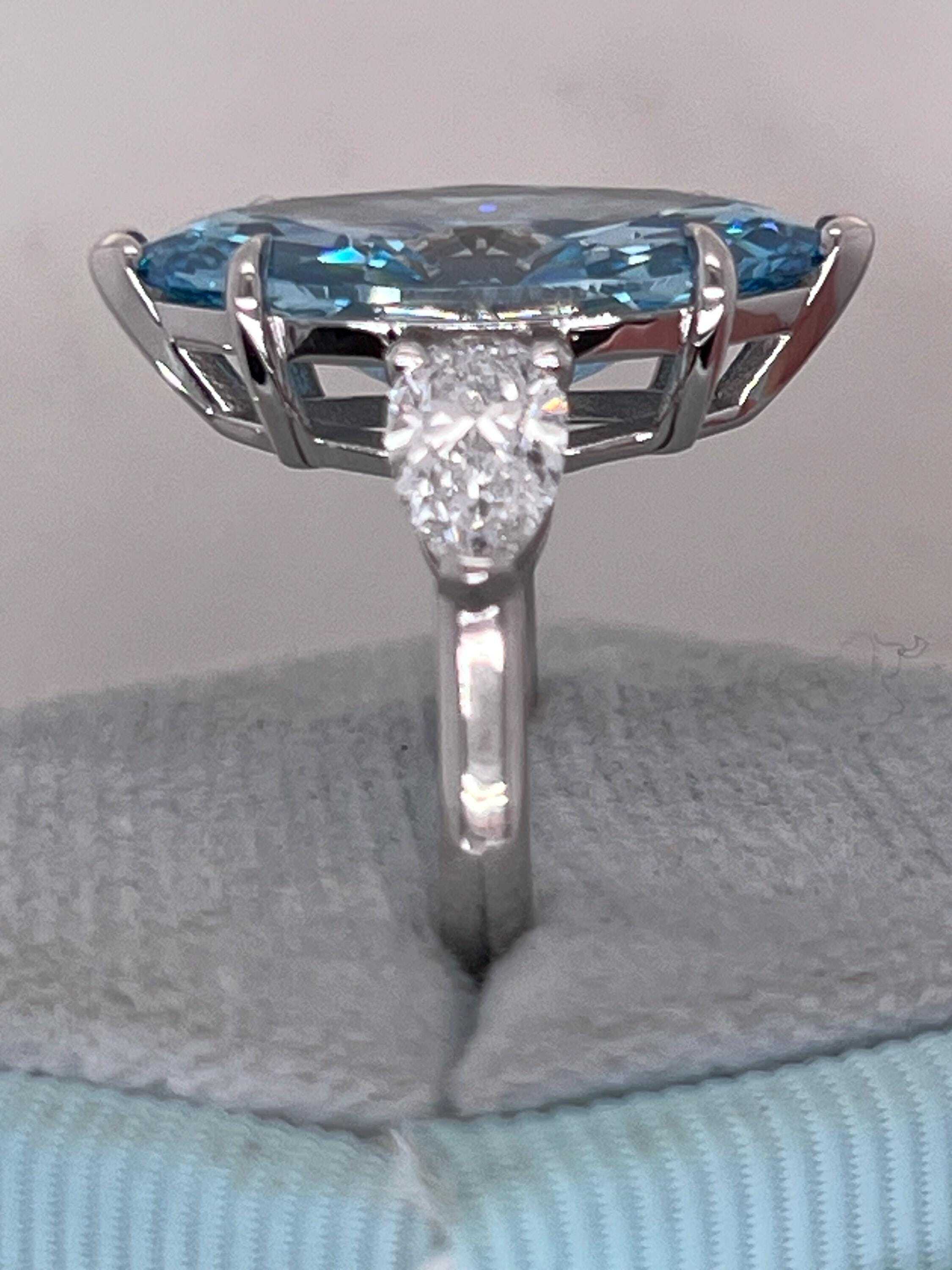 7 Carat Fancy Vivid Blue Color Marquise Three Stone Engagement Ring Side Pear Diamonds