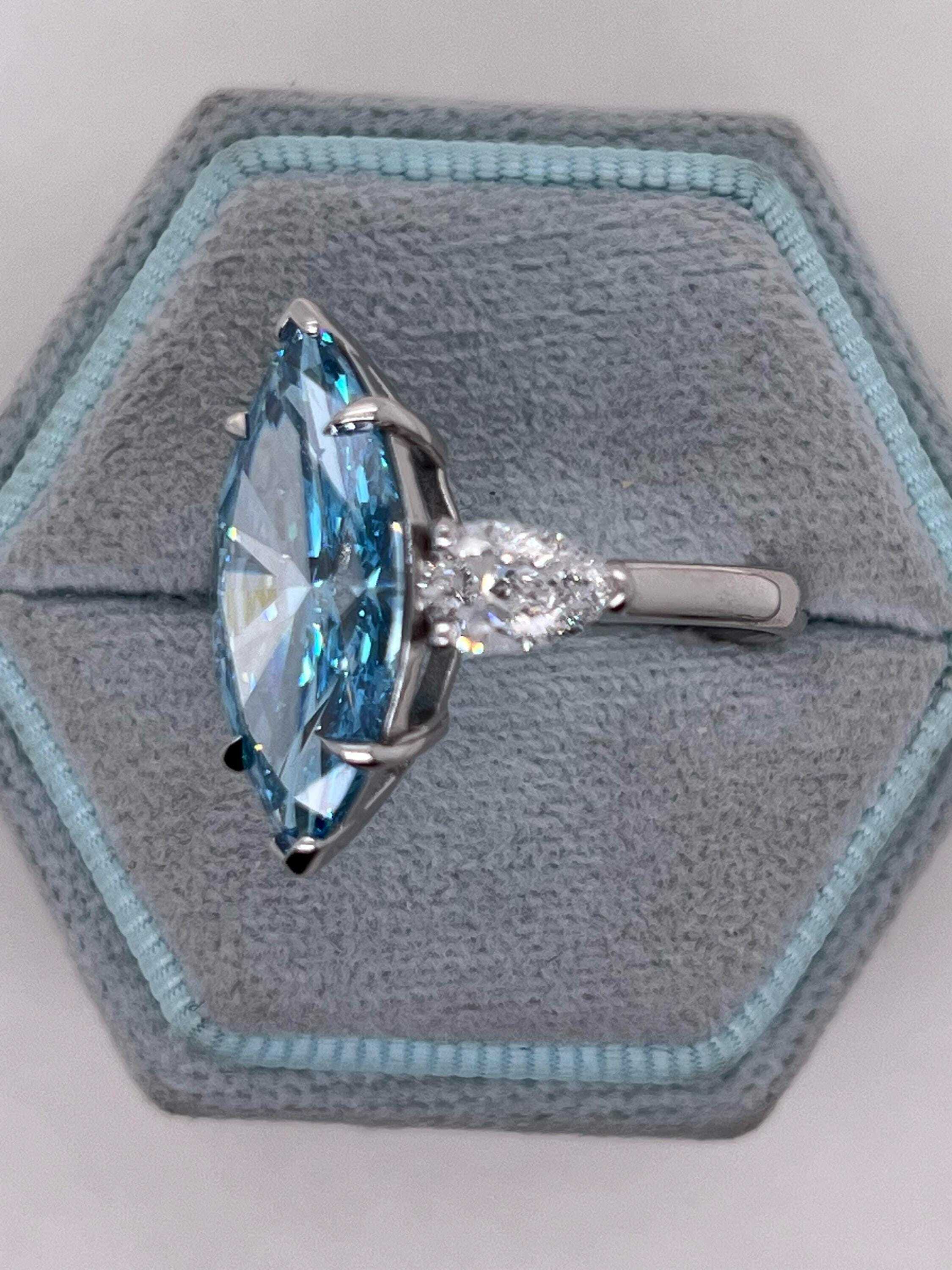 7 Carat Fancy Vivid Blue Color Marquise Three Stone Engagement Ring Side Pear Diamonds