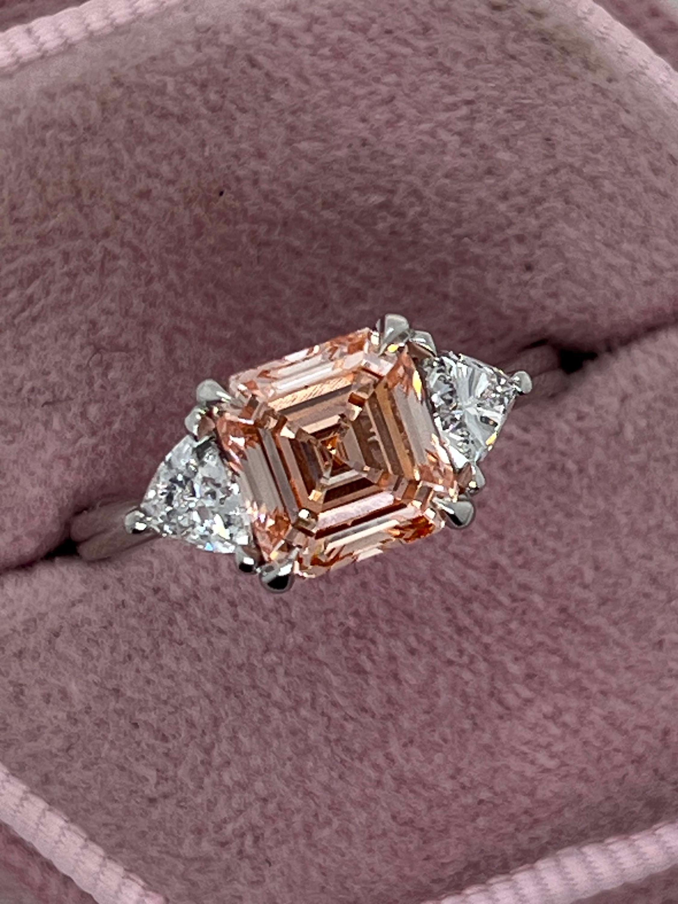 2.5 Carat Fancy Vivid Pink Asscher Cut Three Diamond Engagement Ring Side Trillions