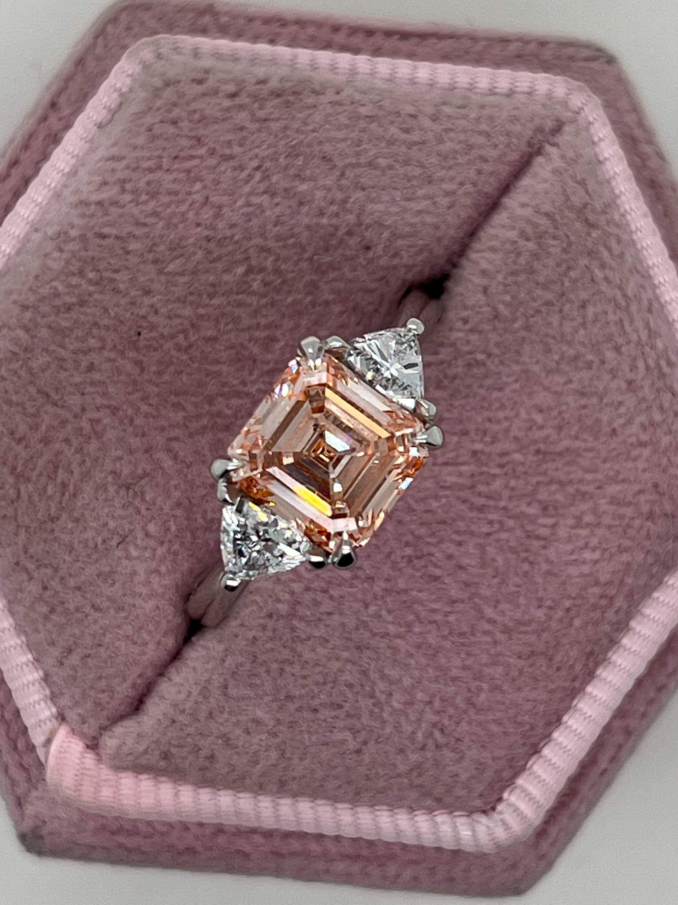 2.5 Carat Fancy Vivid Pink Asscher Cut Three Diamond Engagement Ring Side Trillions