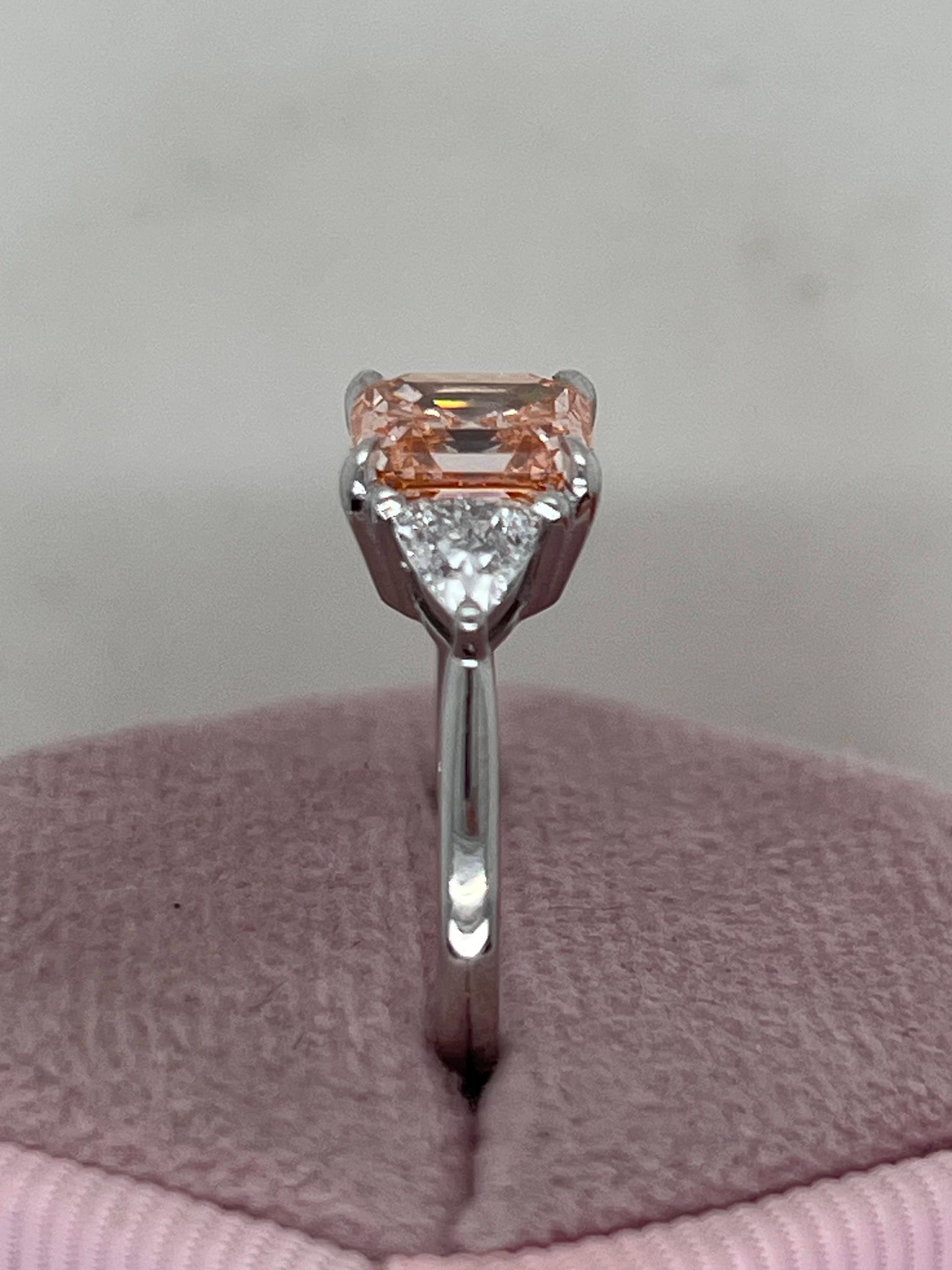2.5 Carat Fancy Vivid Pink Asscher Cut Three Diamond Engagement Ring Side Trillions