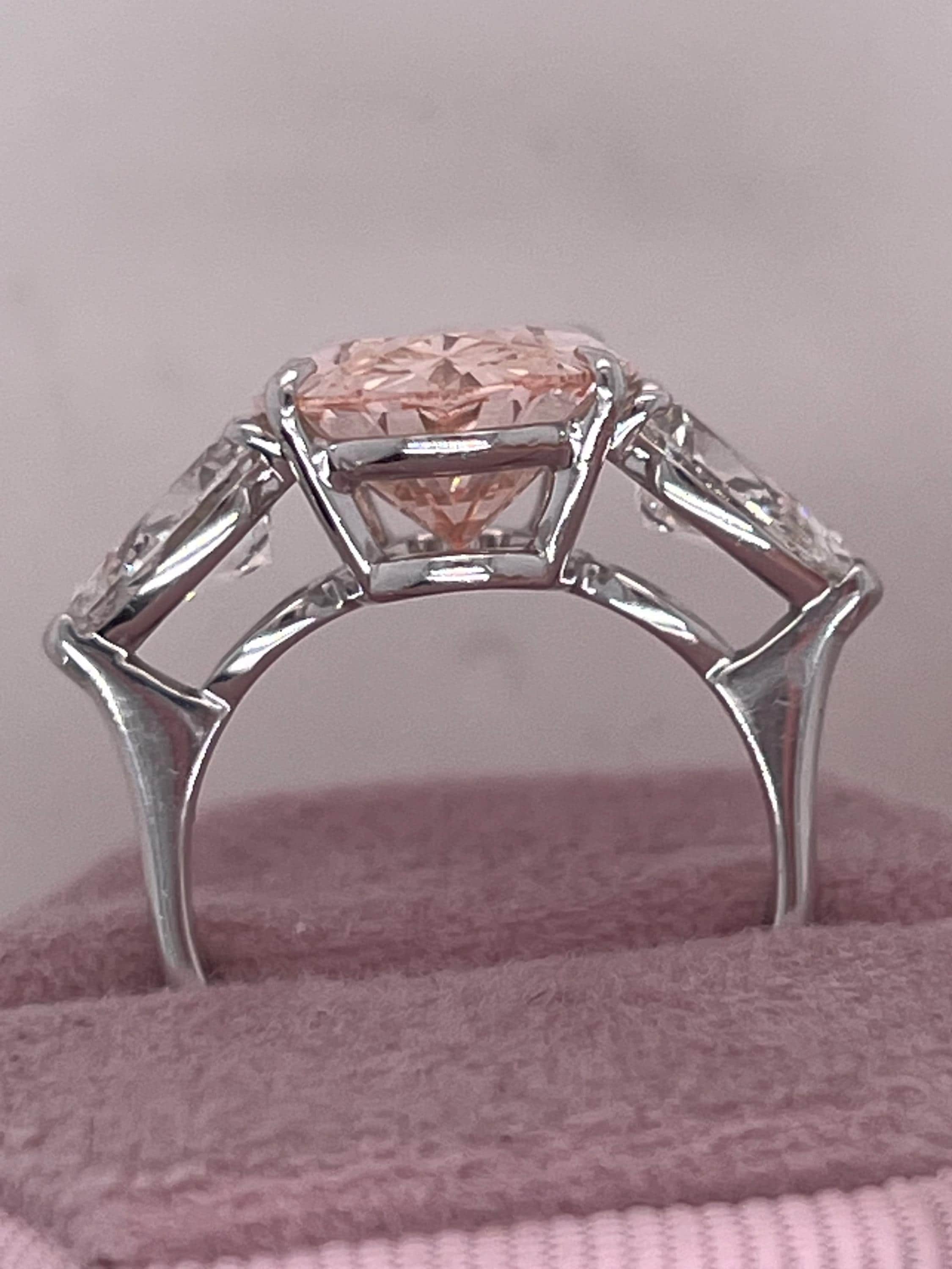9 Carat Total Fancy Vivid Pink Oval Cut Three Stone Engagement Ring, Side Pear Diamonds
