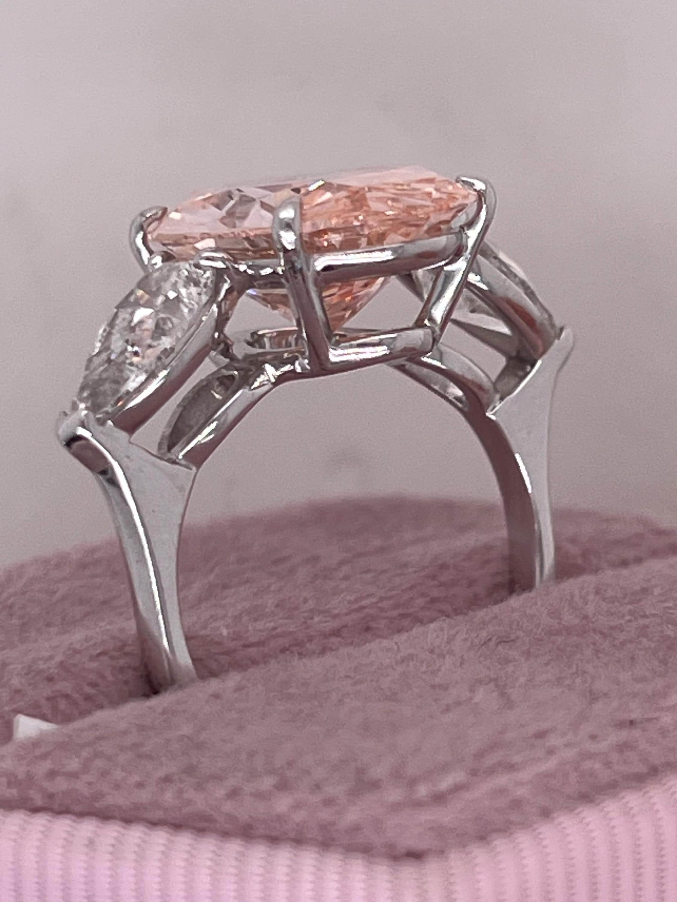 9 Carat Total Fancy Vivid Pink Oval Cut Three Stone Engagement Ring, Side Pear Diamonds