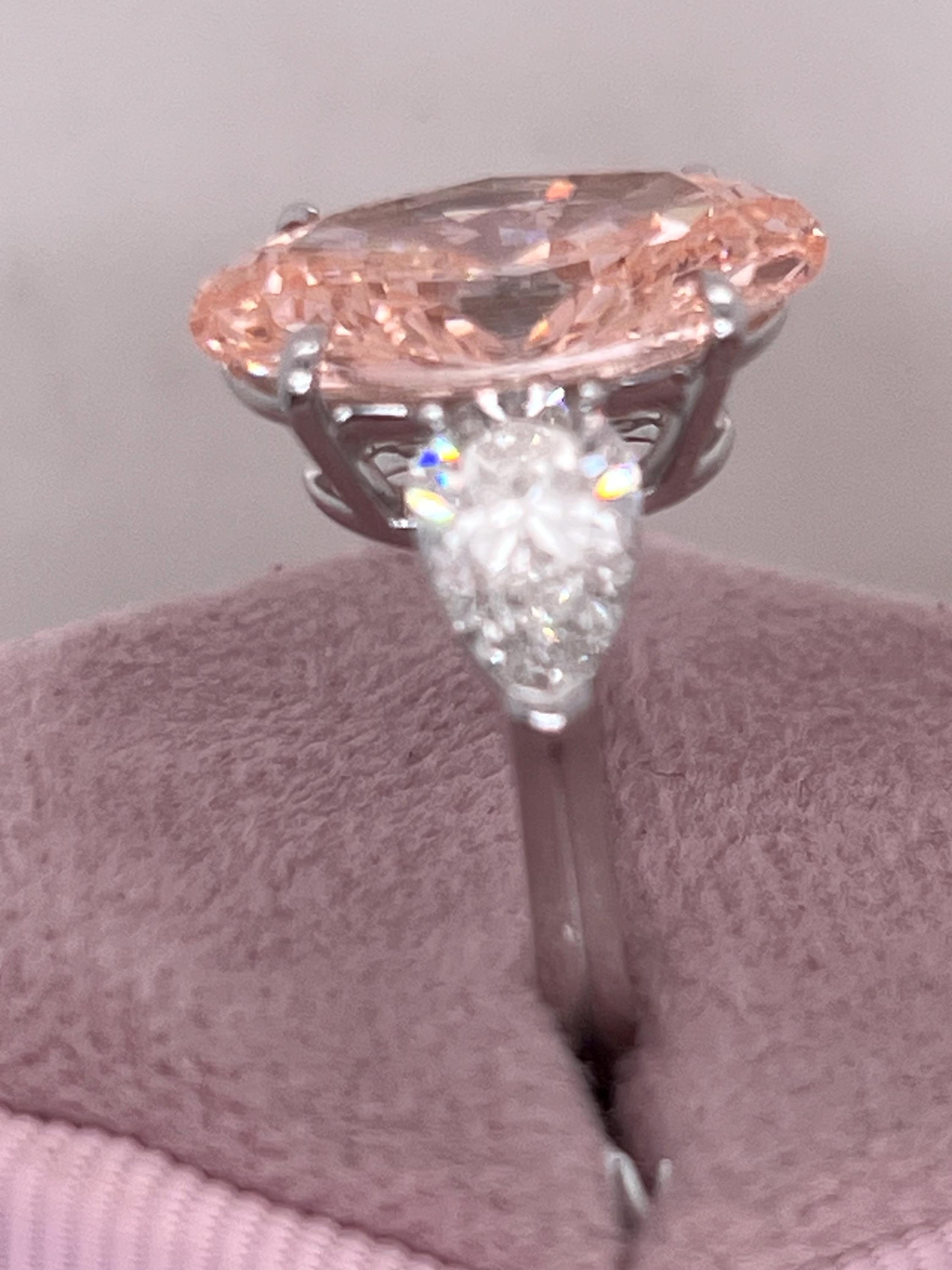 9 Carat Total Fancy Vivid Pink Oval Cut Three Stone Engagement Ring, Side Pear Diamonds