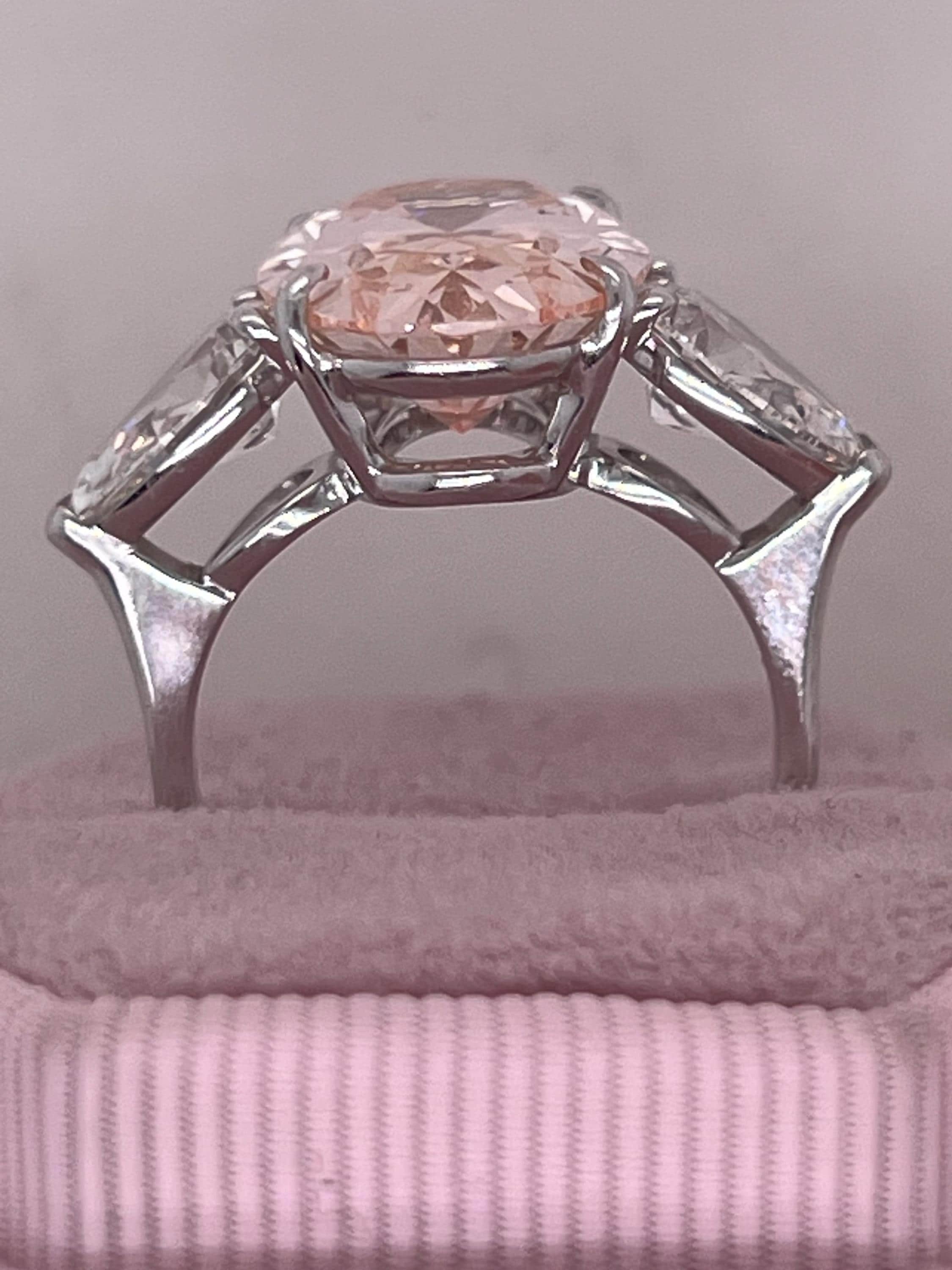 9 Carat Total Fancy Vivid Pink Oval Cut Three Stone Engagement Ring, Side Pear Diamonds