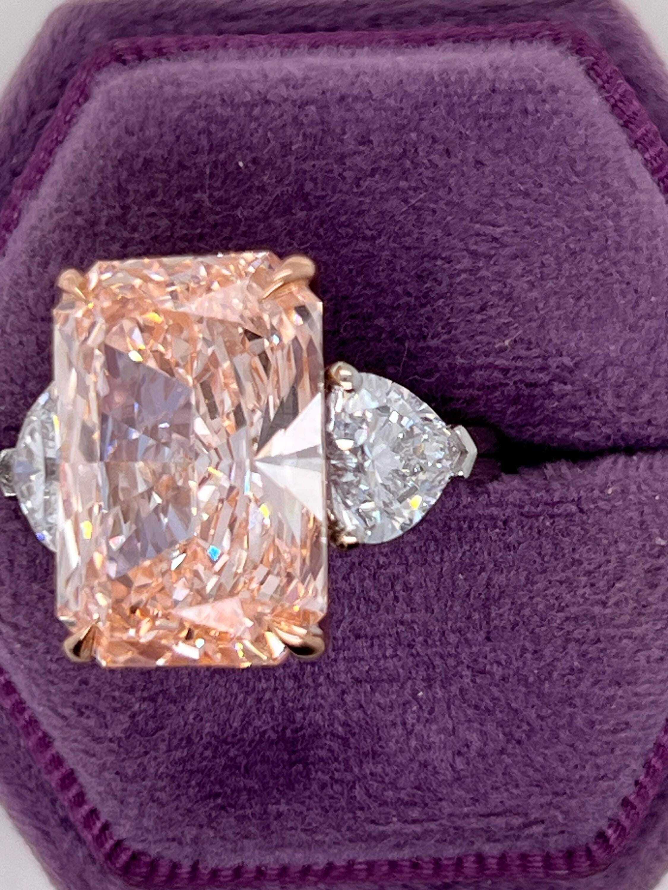 13 Carat Fancy Vivid Pink Radiant Cut with Side Hearts Three Stone Diamond Engagement Ring