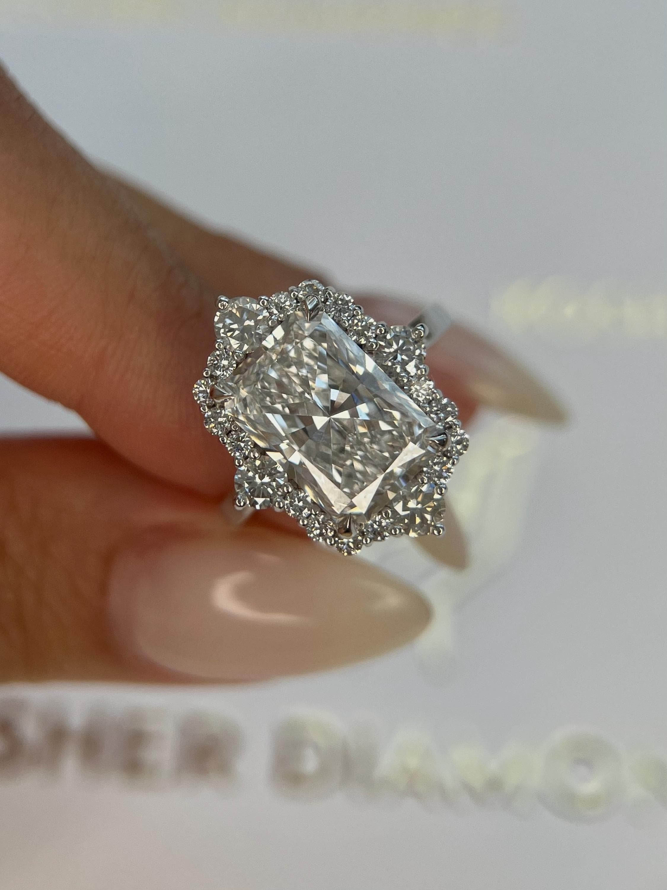 5.75 Carat Elongated Radiant Cut Diamond Halo Engagement Ring Side Round