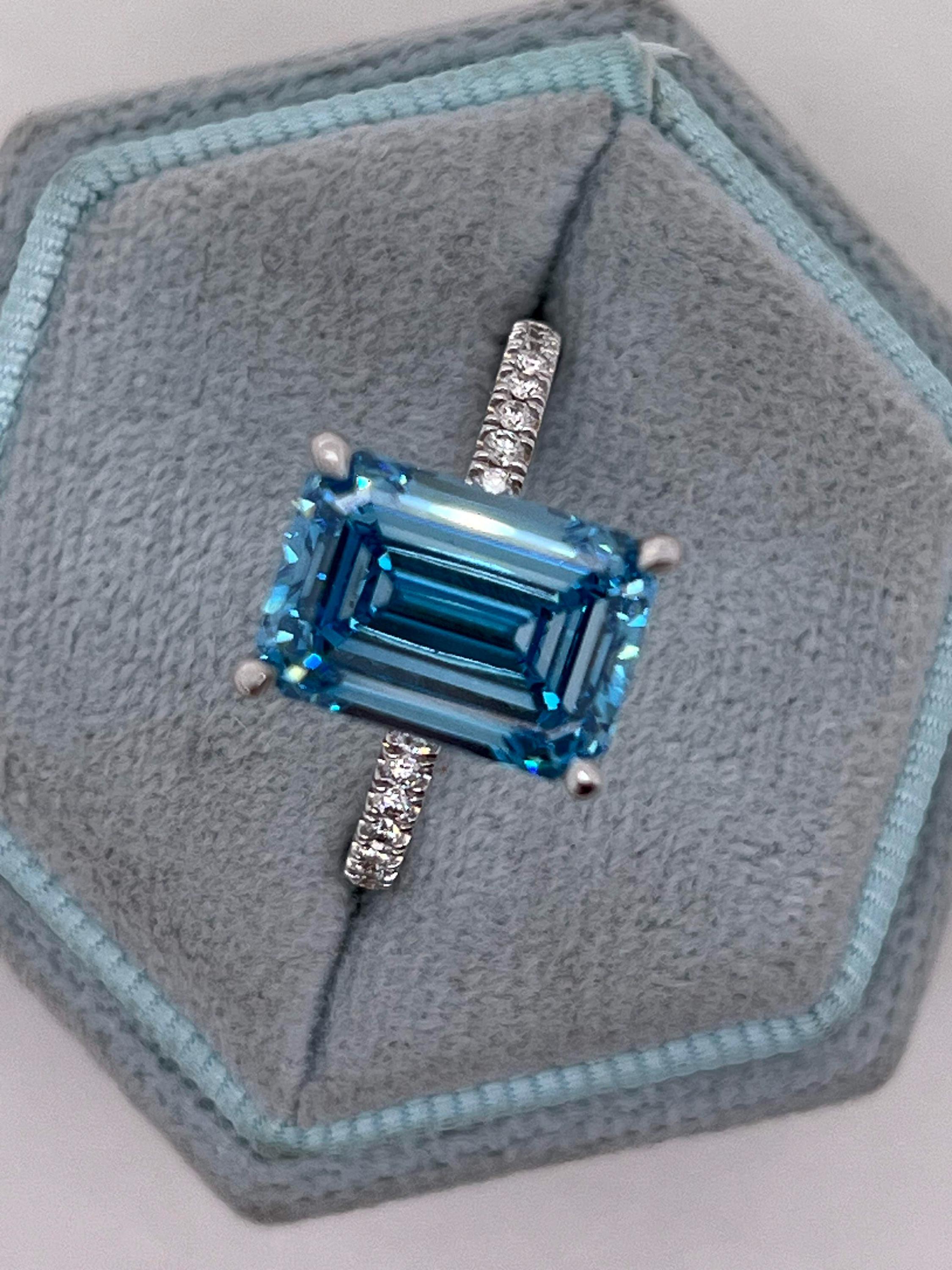 5.25 Carat Fancy Vivid Blue Color Emerald Cut Diamond Hidden Halo Engagement Ring