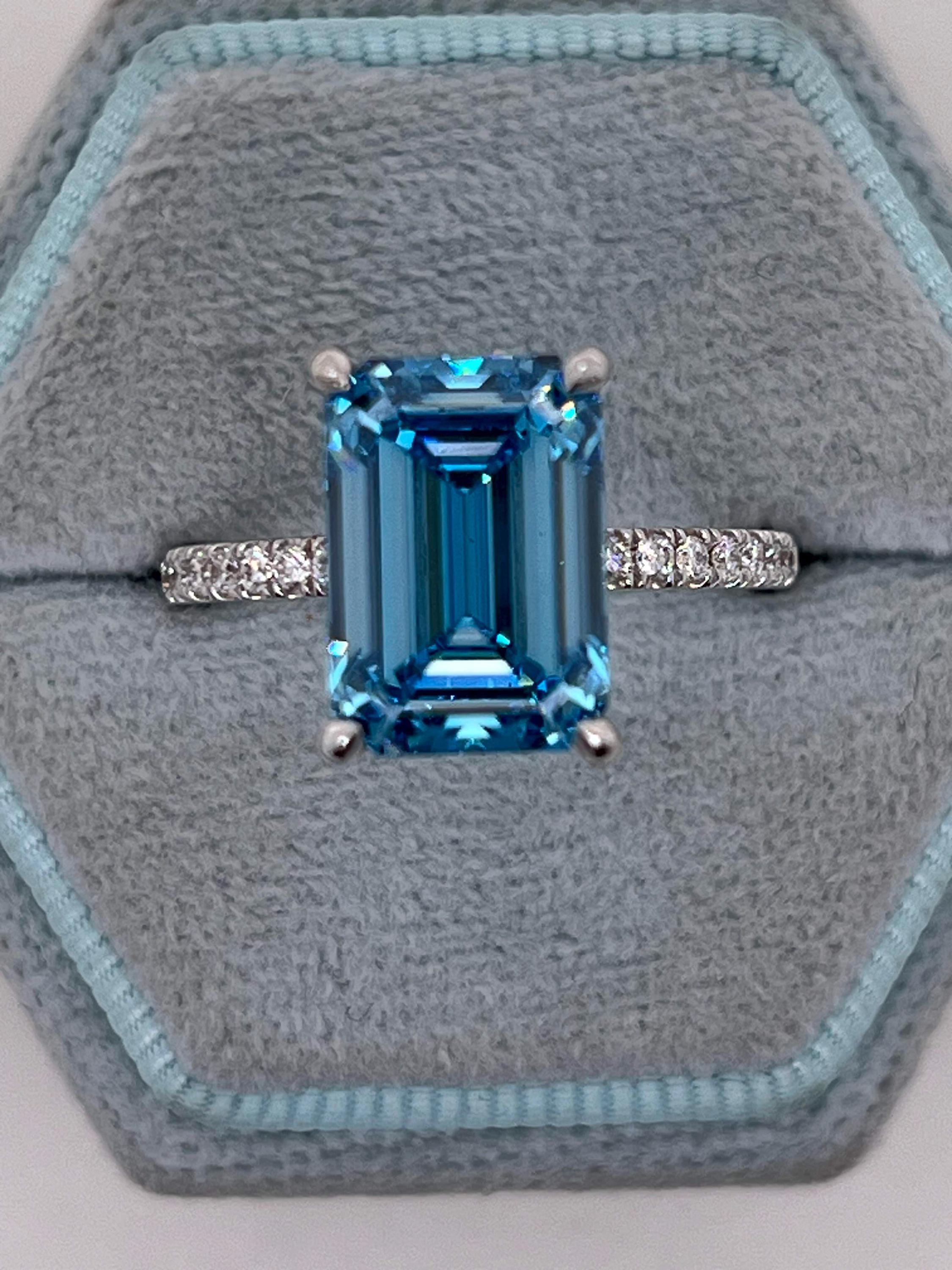 5.25 Carat Fancy Vivid Blue Color Emerald Cut Diamond Hidden Halo Engagement Ring