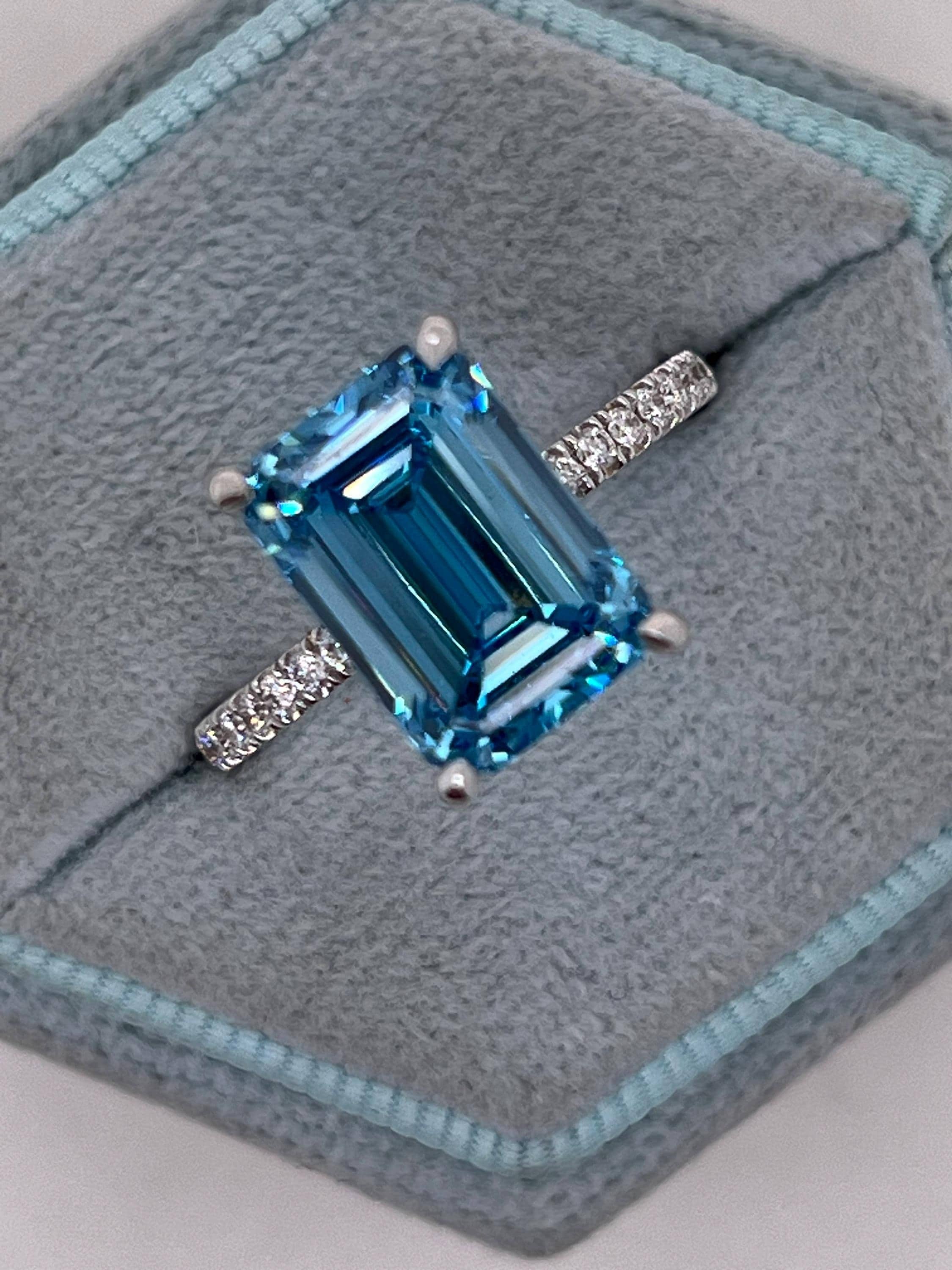 5.25 Carat Fancy Vivid Blue Color Emerald Cut Diamond Hidden Halo Engagement Ring
