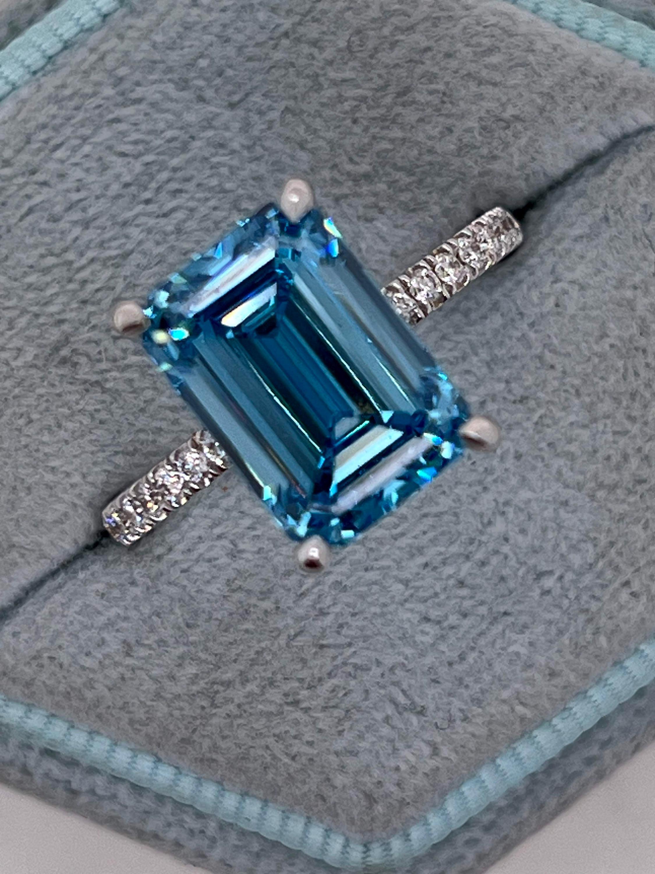 5.25 Carat Fancy Vivid Blue Color Emerald Cut Diamond Hidden Halo Engagement Ring