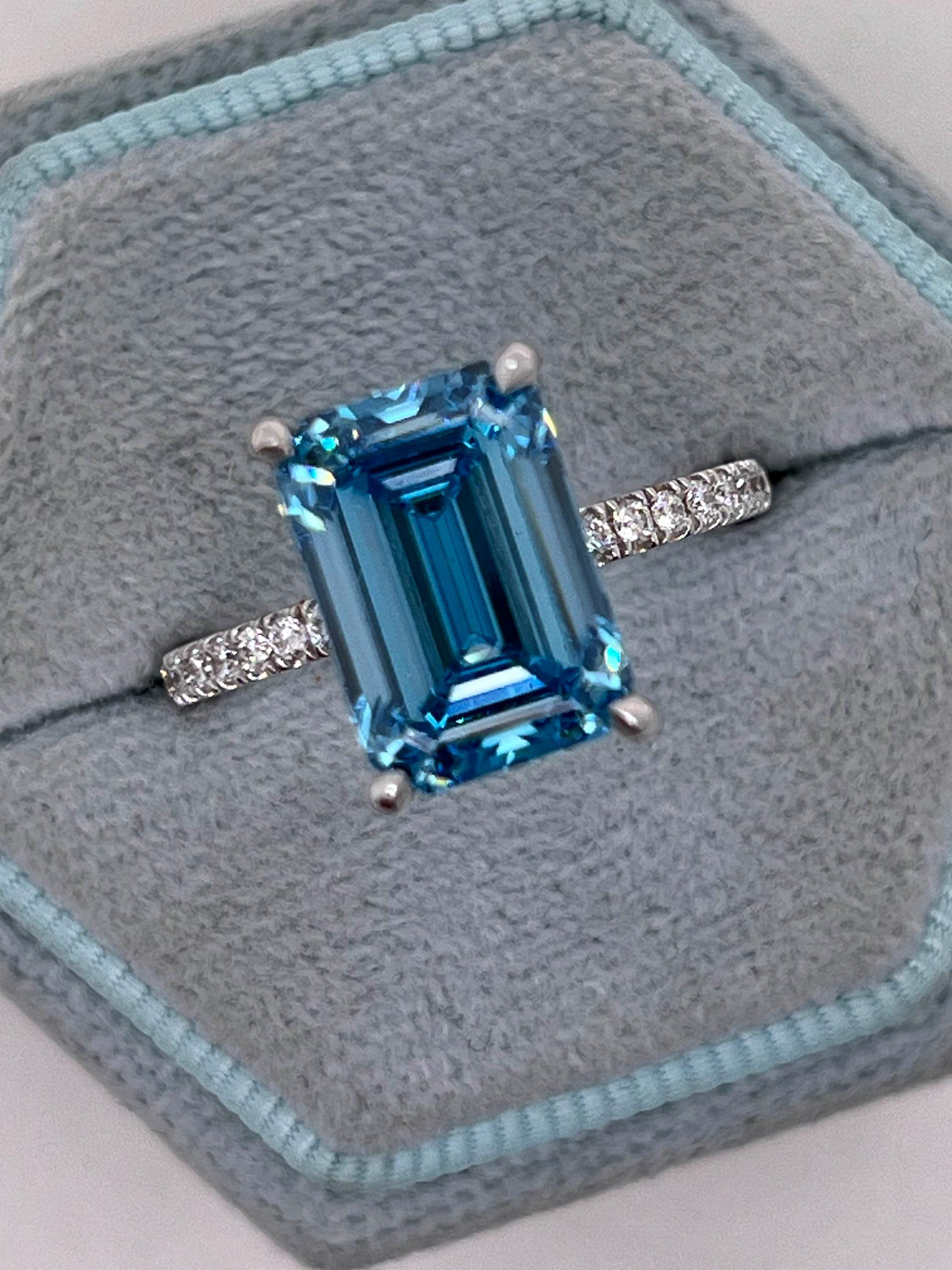 5.25 Carat Fancy Vivid Blue Color Emerald Cut Diamond Hidden Halo Engagement Ring