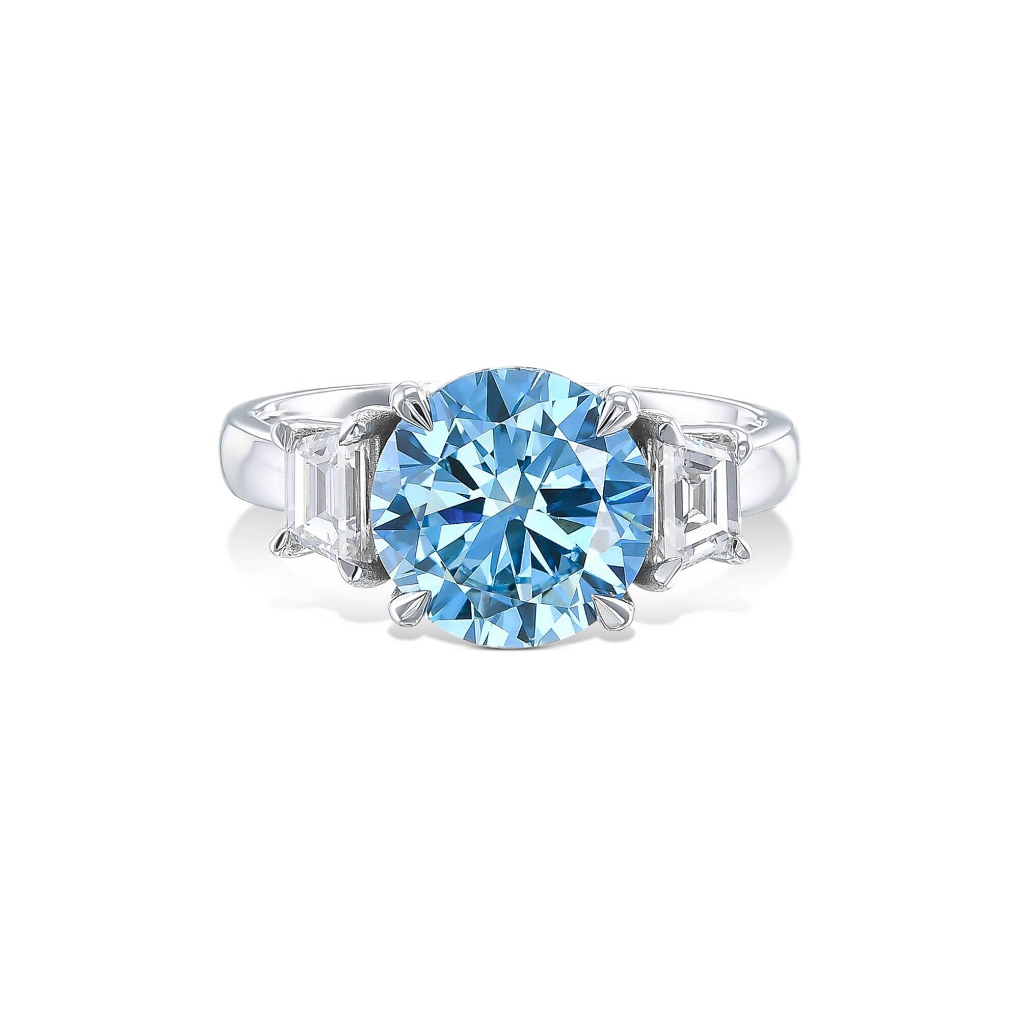 2.5 Carat Fancy Vivid Blue Round Cut Three Stone Diamond Engagement Ring, Side Trapezoid Diamonds