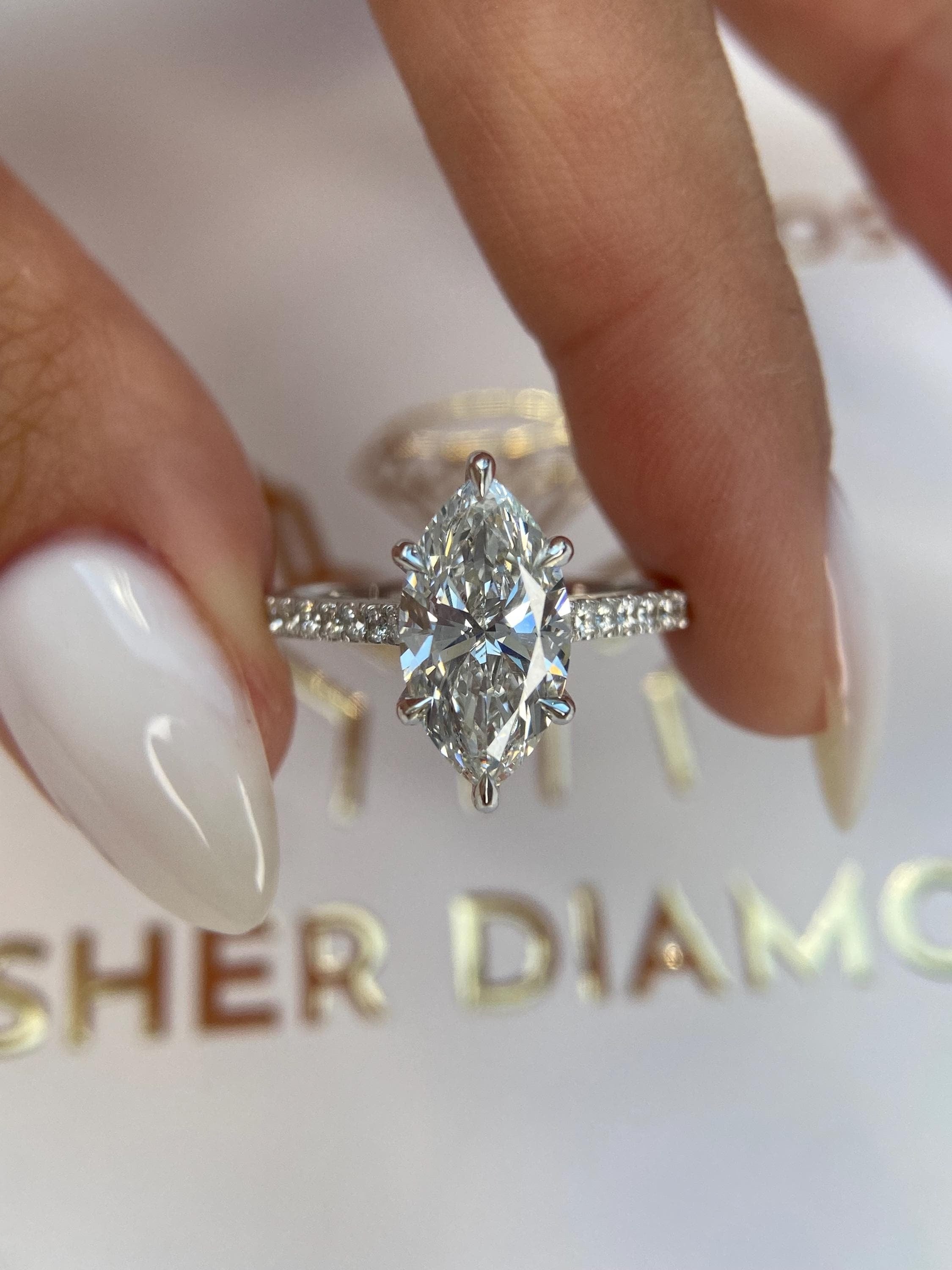 Unique 4.50 carat Marquise Cut Diamond Hidden Halo Cathedral Set Engagement Ring
