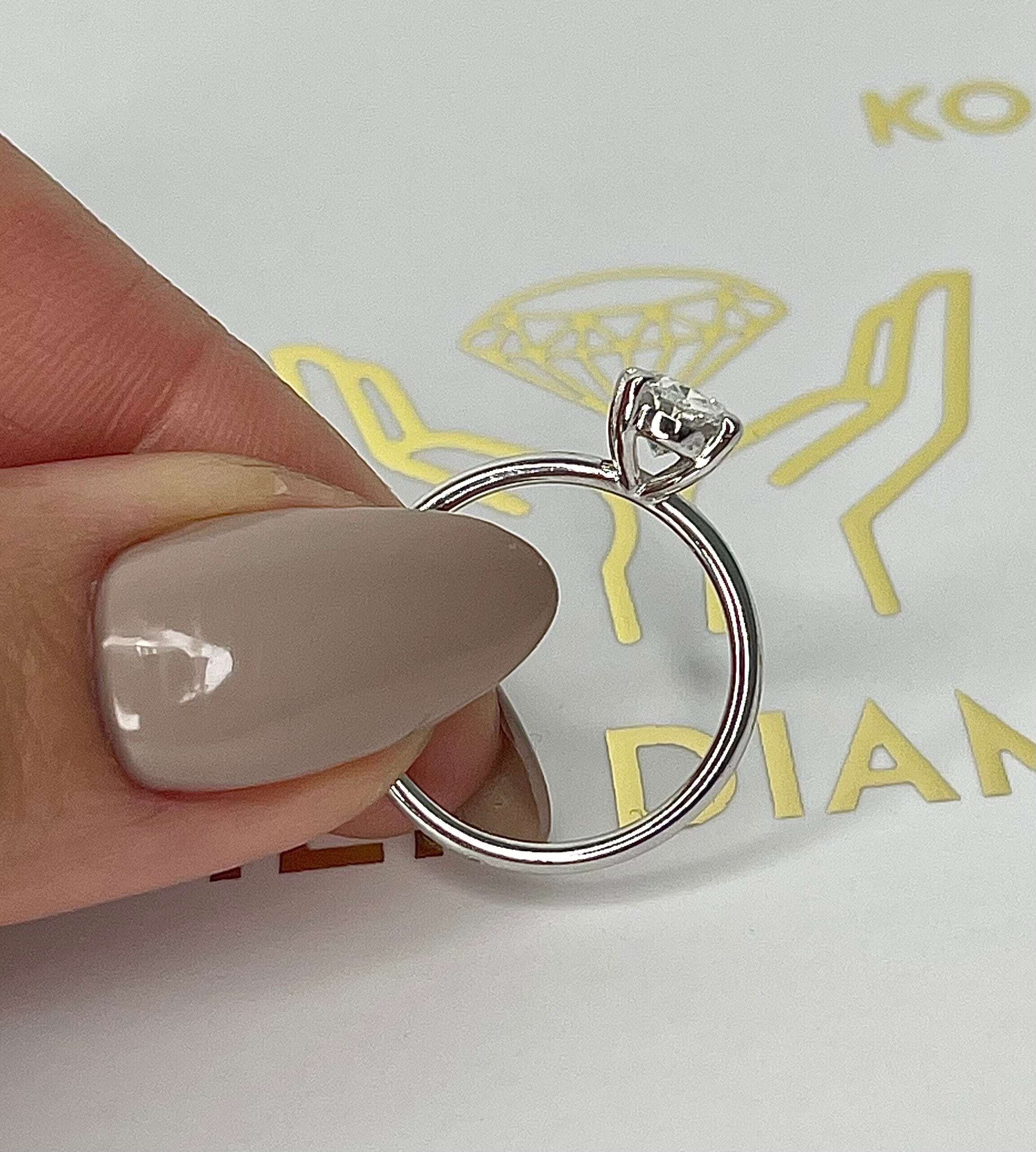 1 Carat Oval Cut Diamond Solitaire Engagement Ring
