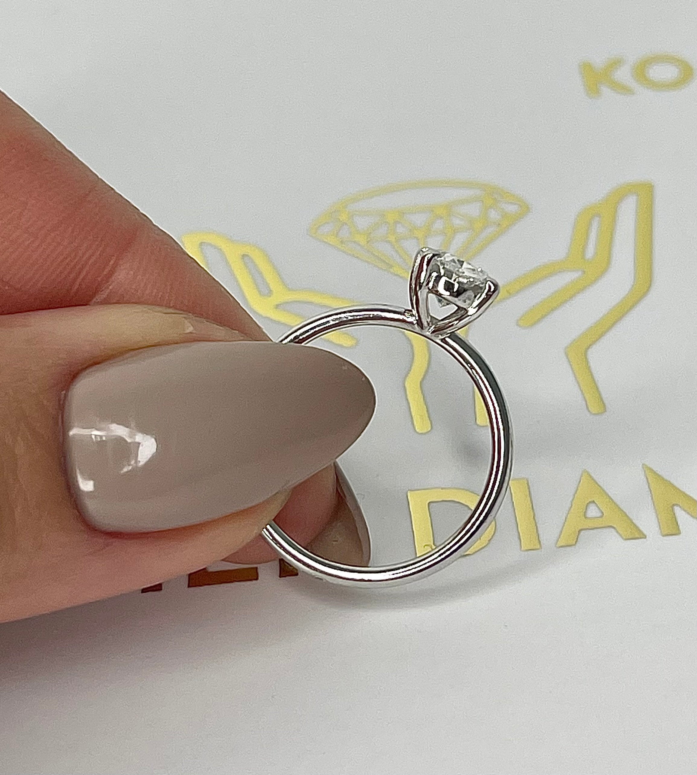 1 Carat Oval Cut Diamond Solitaire Engagement Ring