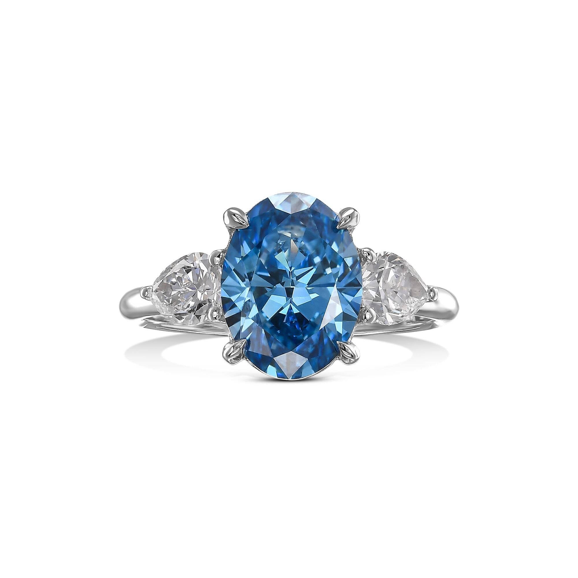3.5 Carat Fancy Vivid Blue Oval Cut Three Stone Diamond Engagement Ring Side Pears