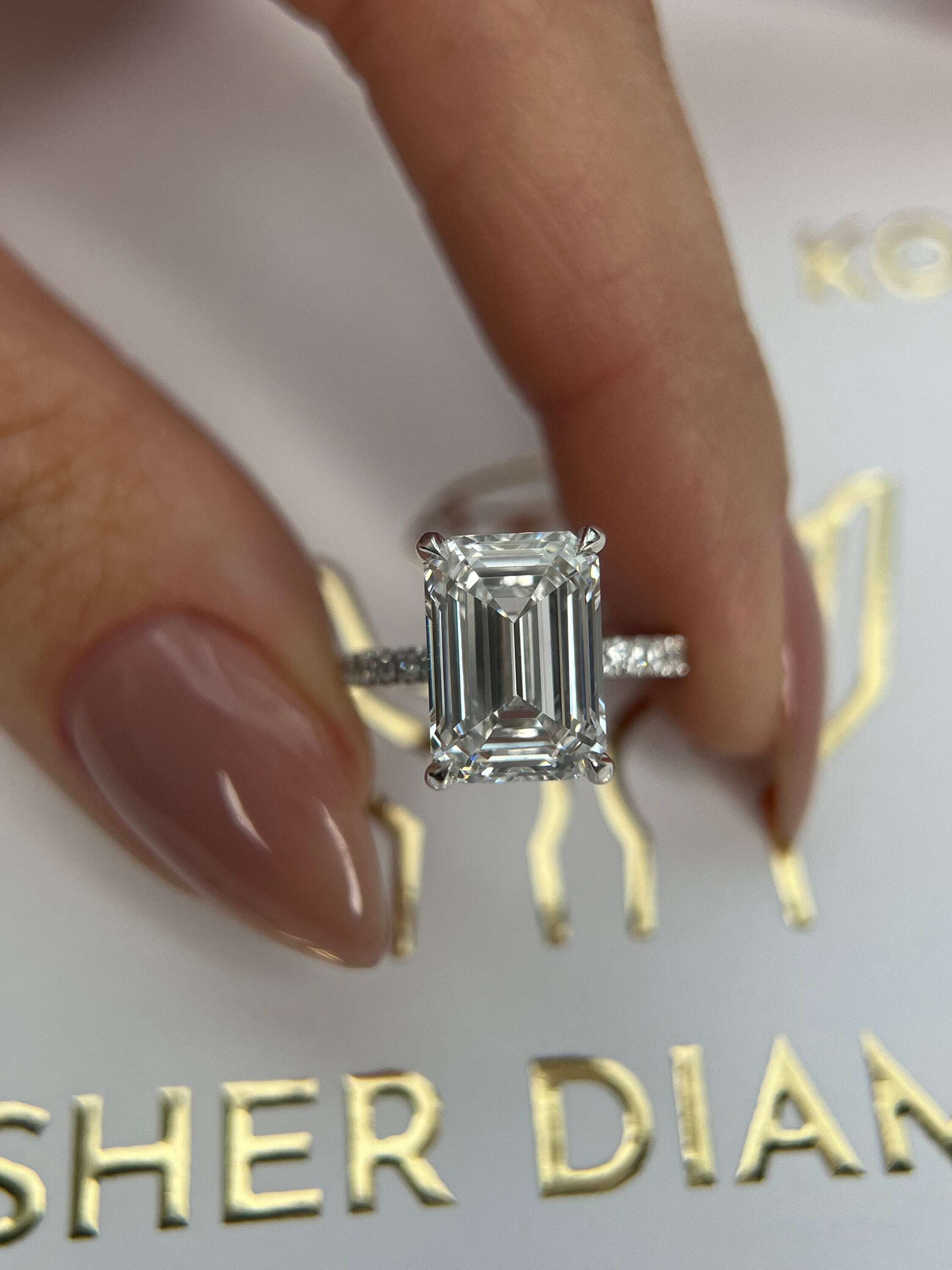 5.3 Carat Emerald Cut Diamond Solitaire Hidden Halo Engagement Ring, Side Round Diamonds