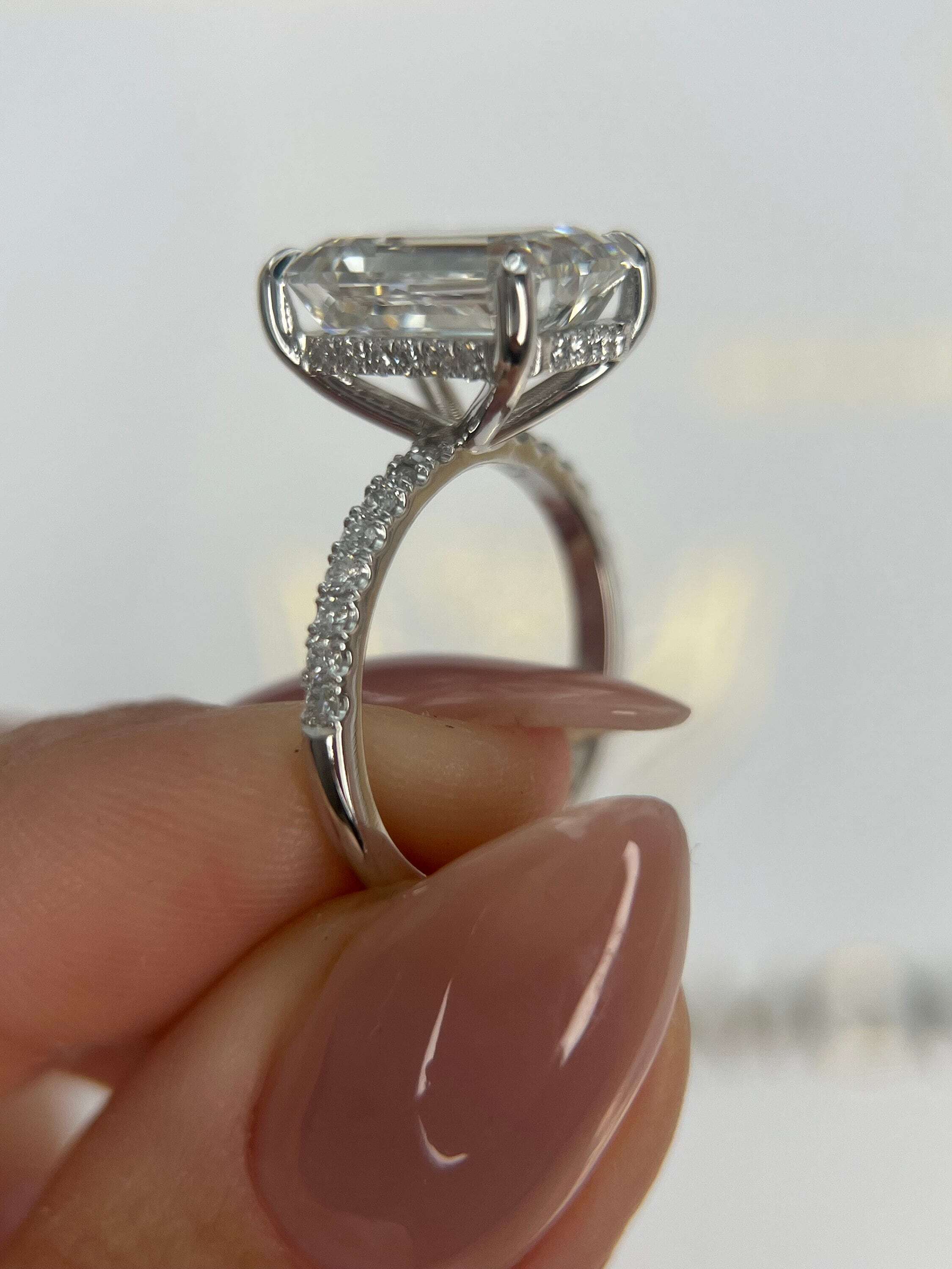 5.3 Carat Emerald Cut Diamond Solitaire Hidden Halo Engagement Ring, Side Round Diamonds