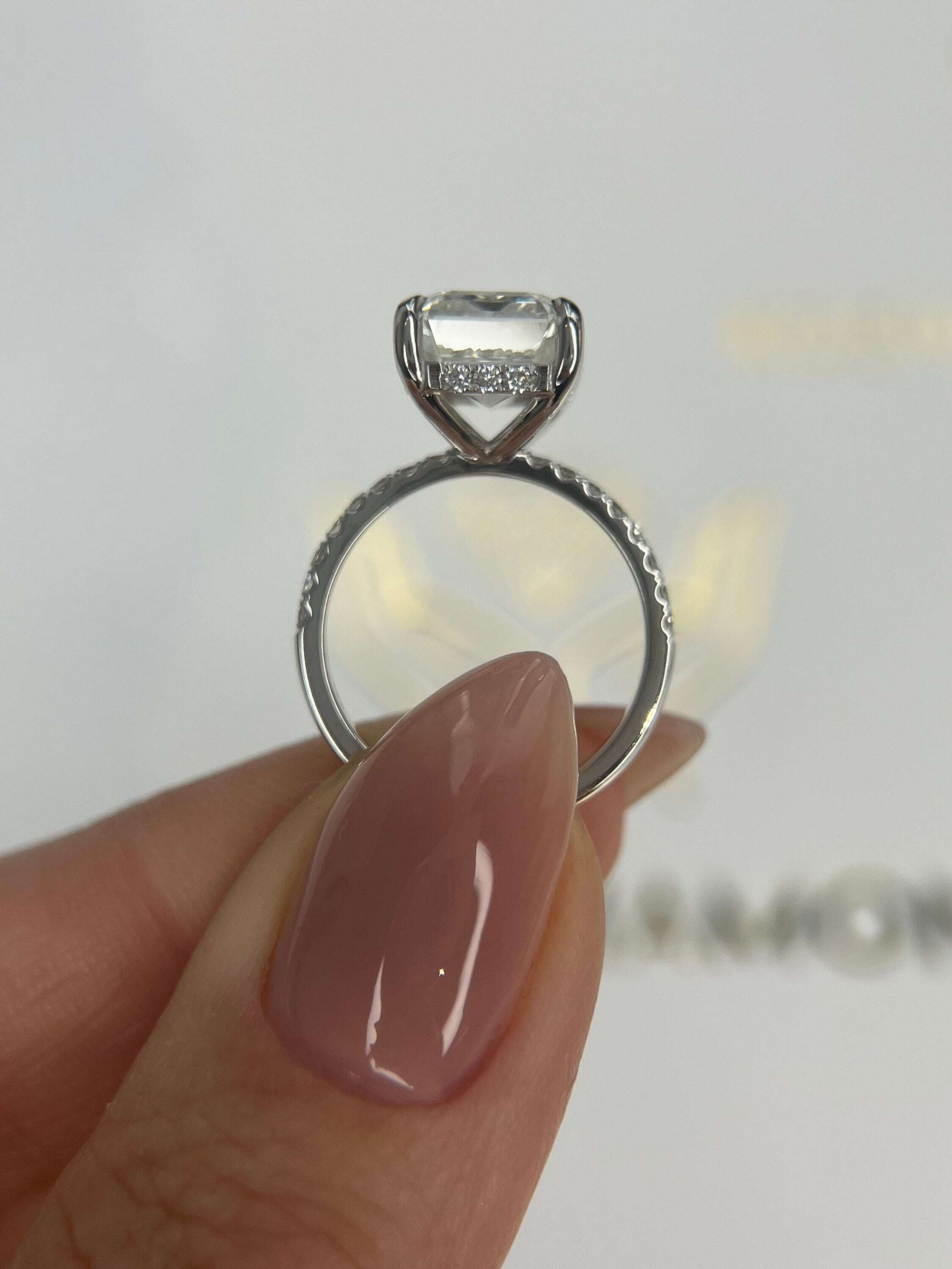 5.3 Carat Emerald Cut Diamond Solitaire Hidden Halo Engagement Ring, Side Round Diamonds