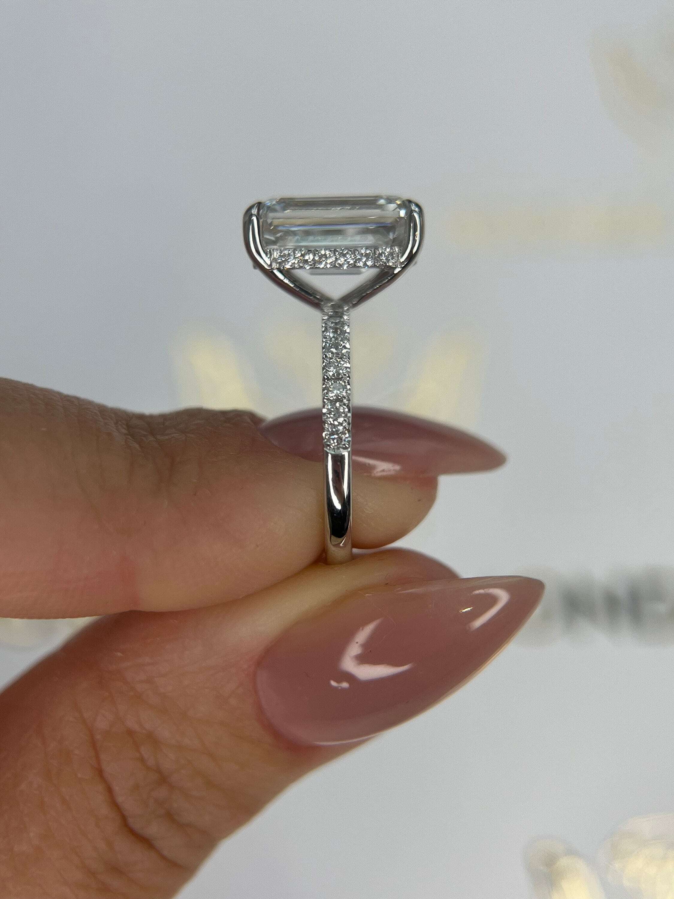 5.3 Carat Emerald Cut Diamond Solitaire Hidden Halo Engagement Ring, Side Round Diamonds