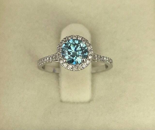1.5 Carat Fancy Vivid Blue Round Cut Diamond Halo Cathedral Engagement Ring with Pavé Side Diamonds