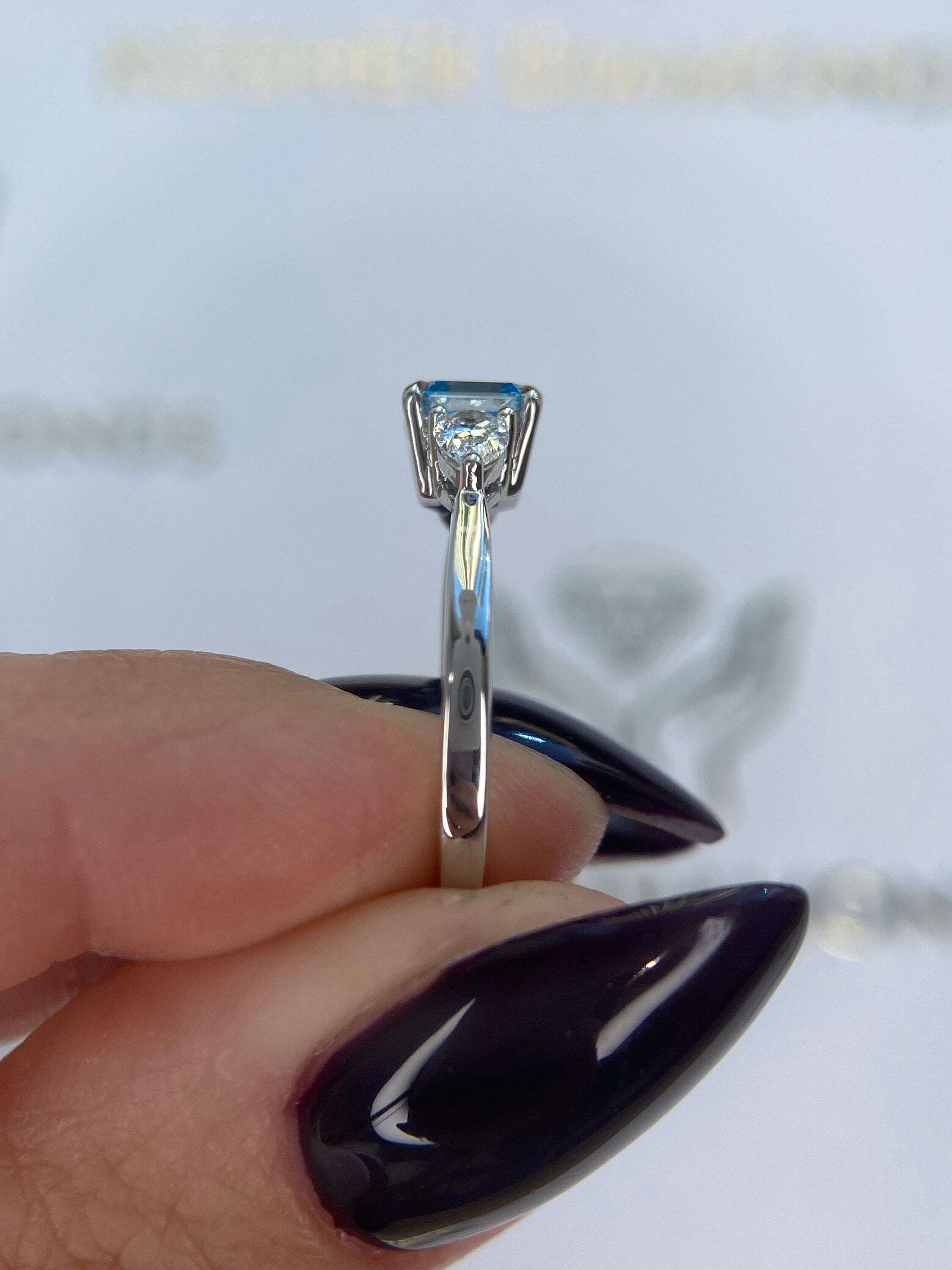 1.3 Carat Fancy Vivid Blue Asscher Cut Diamond Three Stone Engagement Ring, Side Pear Diamonds
