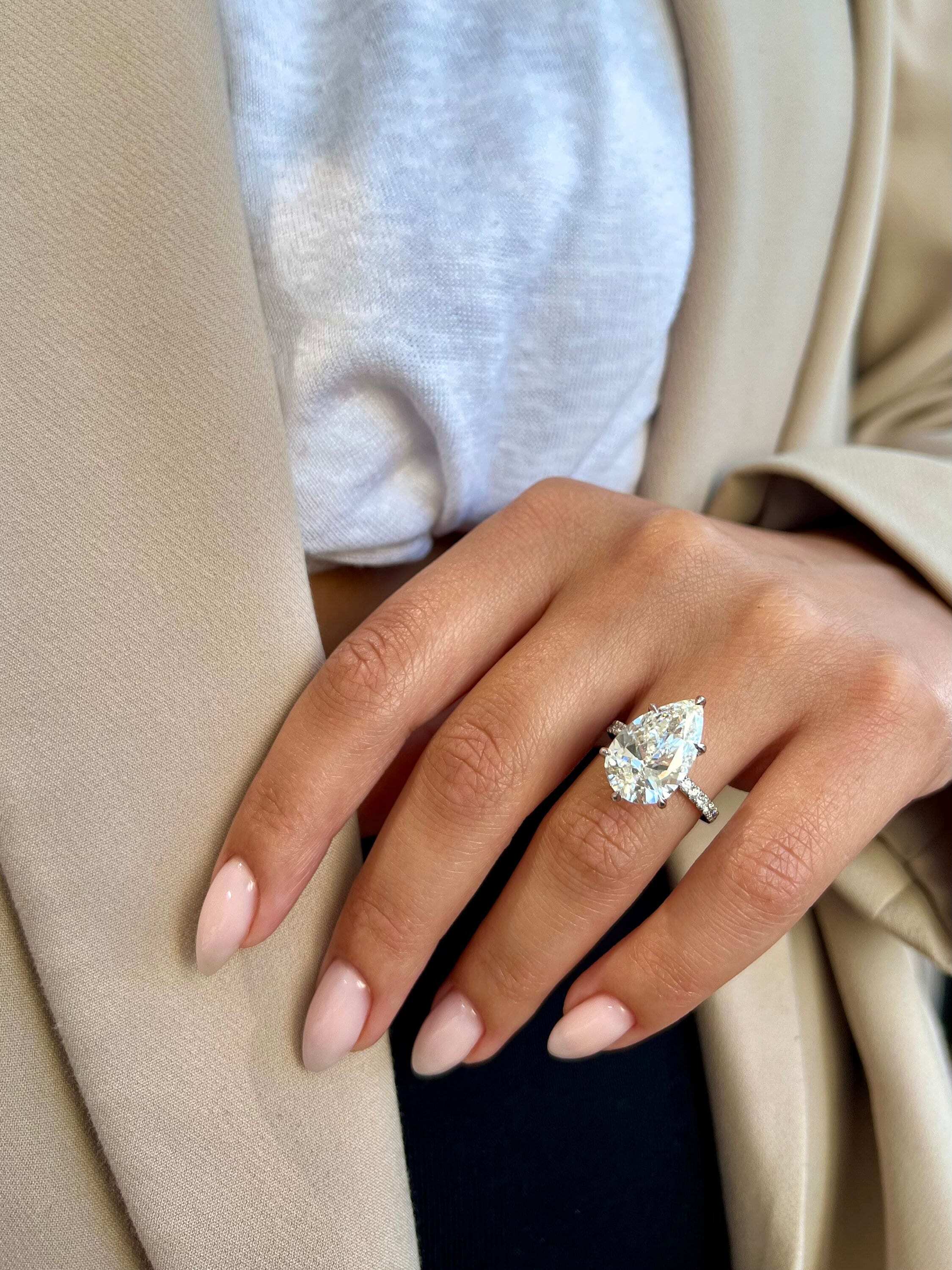 7.5 Carat Pear Cut Hidden Halo Diamond Engagement Ring with Pavé Diamonds