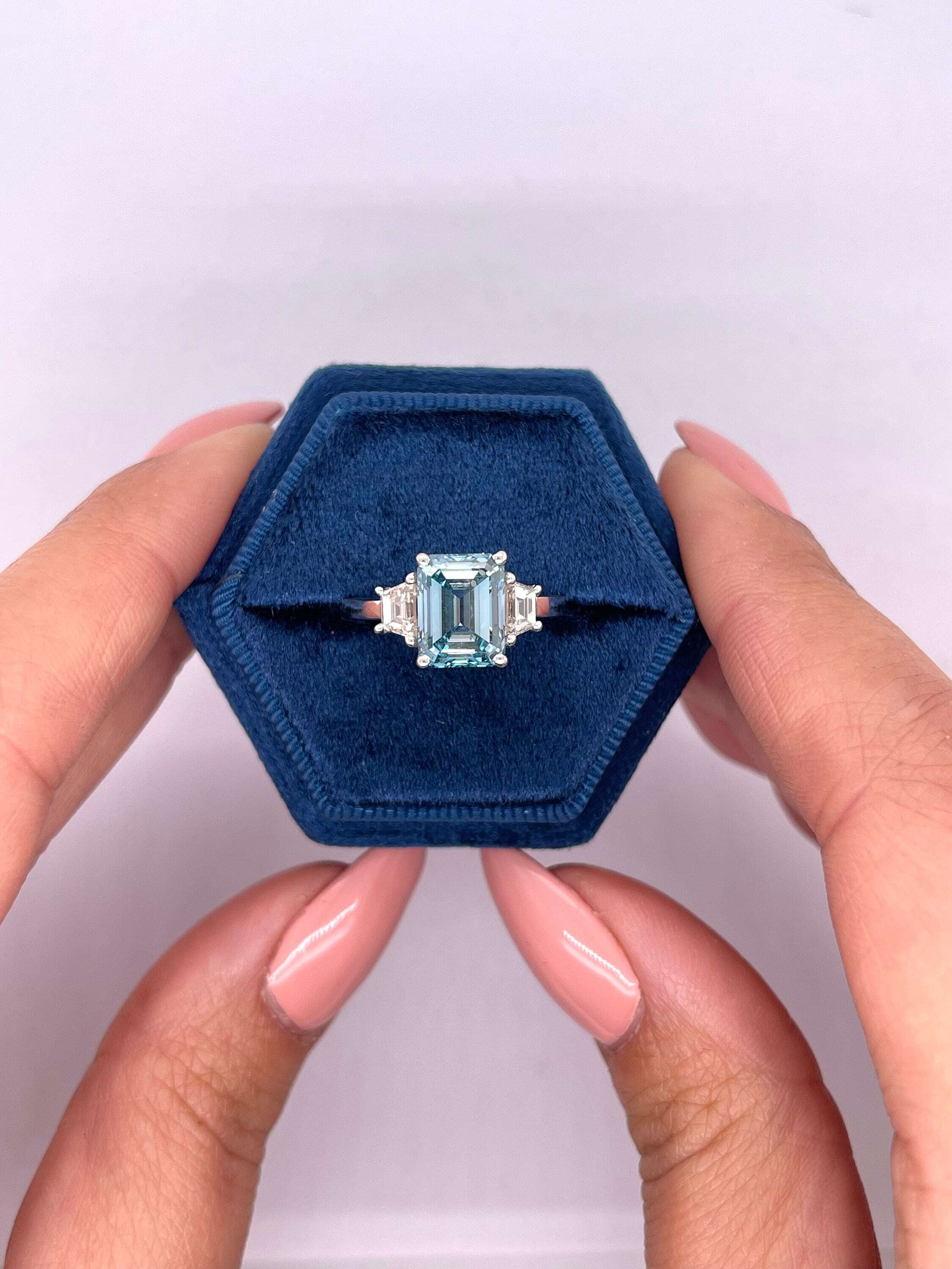 3.5 Carat Fancy Vivid Blue Color Emerald Cut Three Stone Diamond Engagement Ring with Side Trapezoids