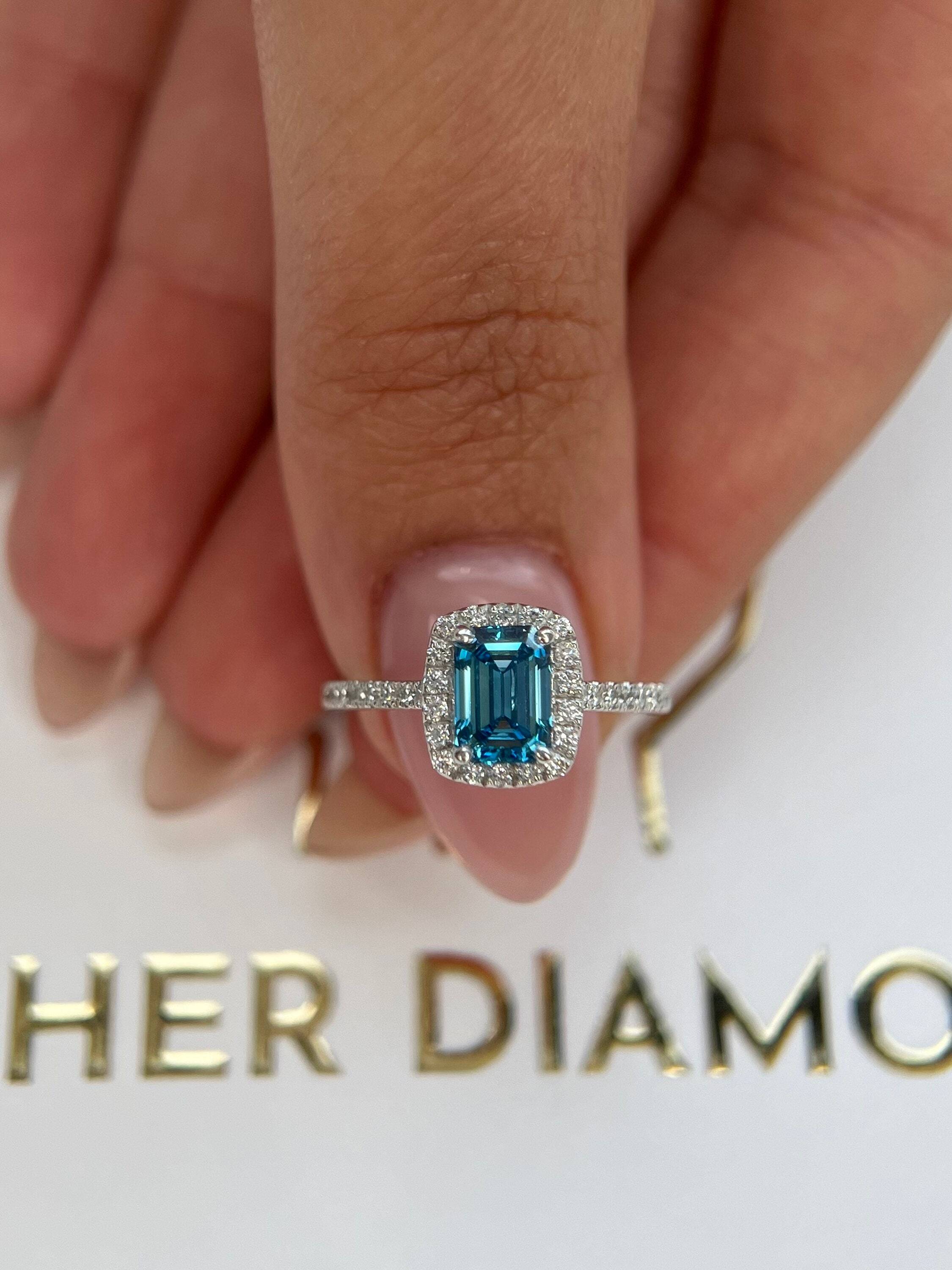 1.25 Carat Fancy Vivid Blue Color Emerald Cut Diamond Halo Engagement Ring