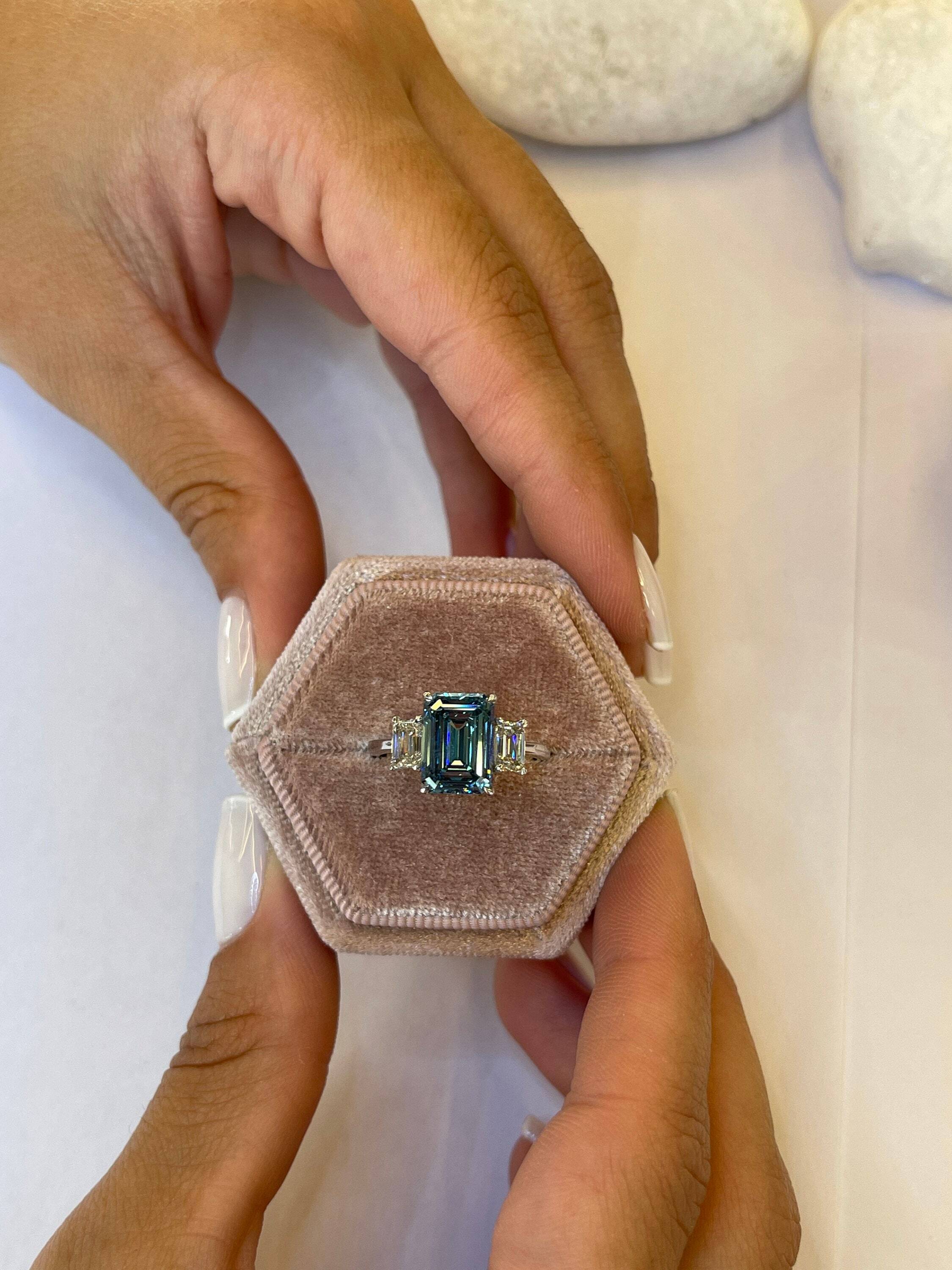 6 Carat Fancy Vivid Blue VVS2 Clarity Emerald Cut Three Stone Diamond Engagement Ring