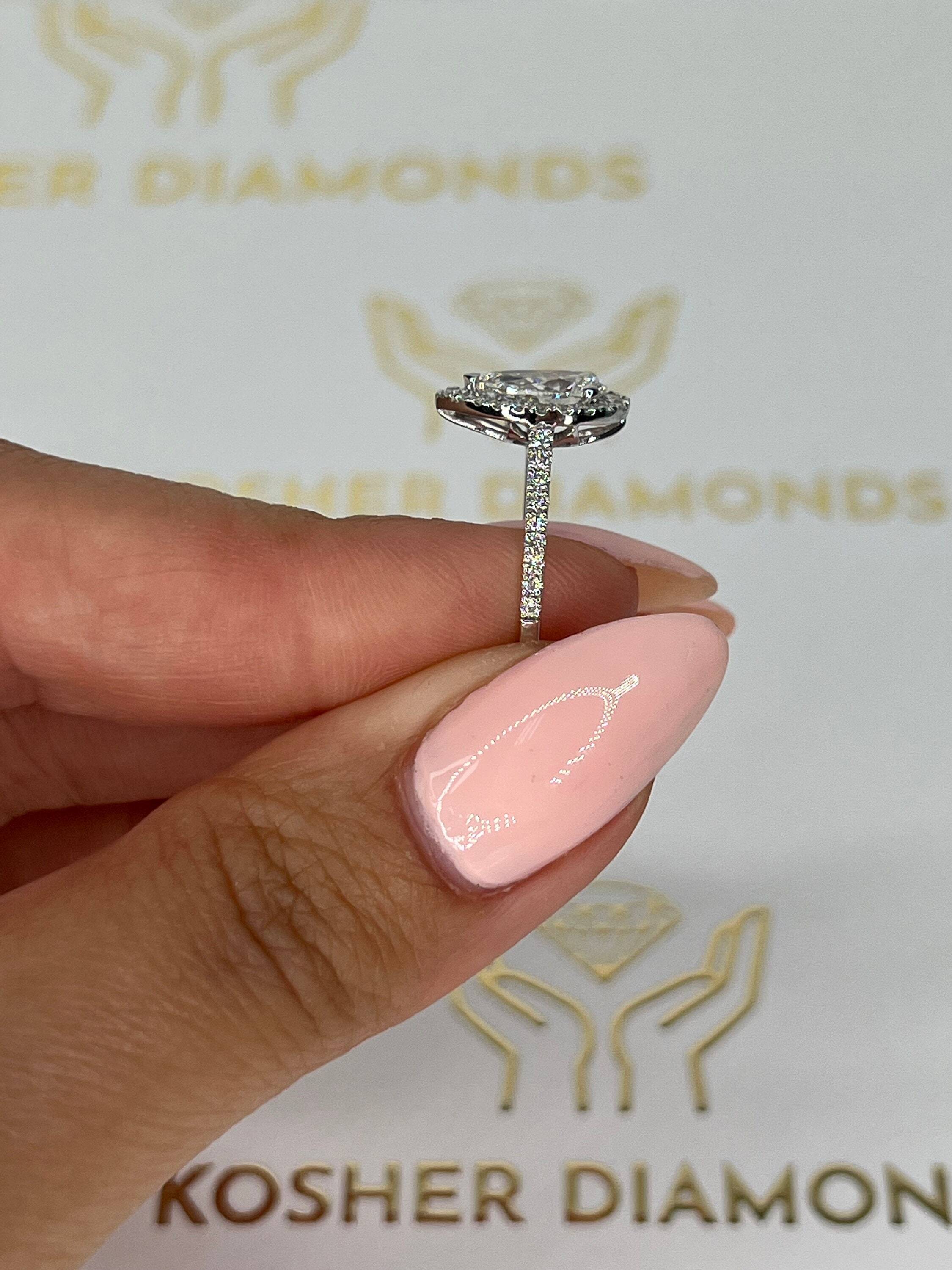 1.3 Carat Pear Cut Diamond Halo Engagement Ring