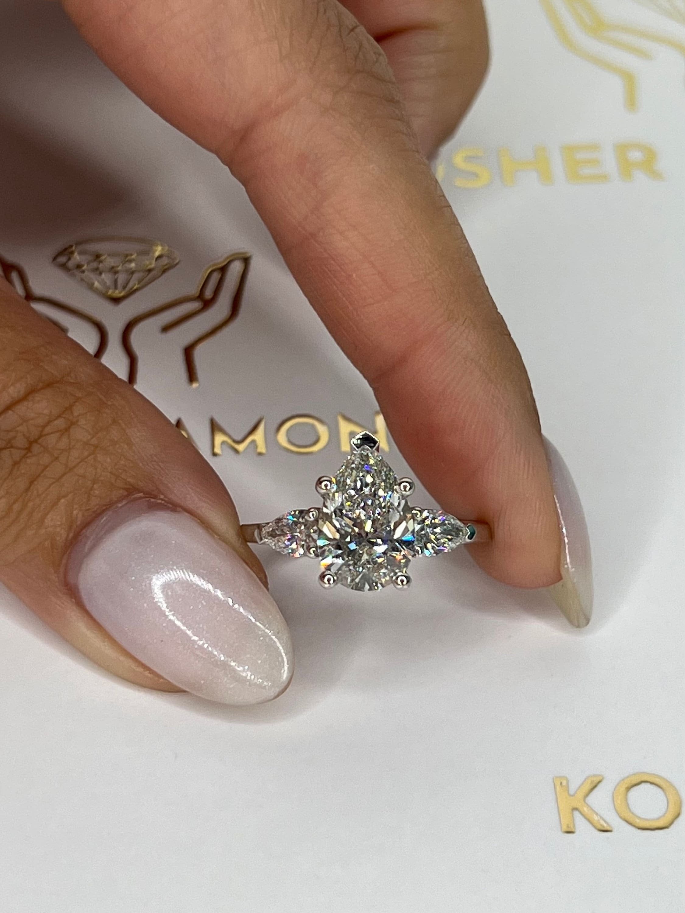 2.5 Carat Total Three Stone Pear Cut Diamond Engagement Ring