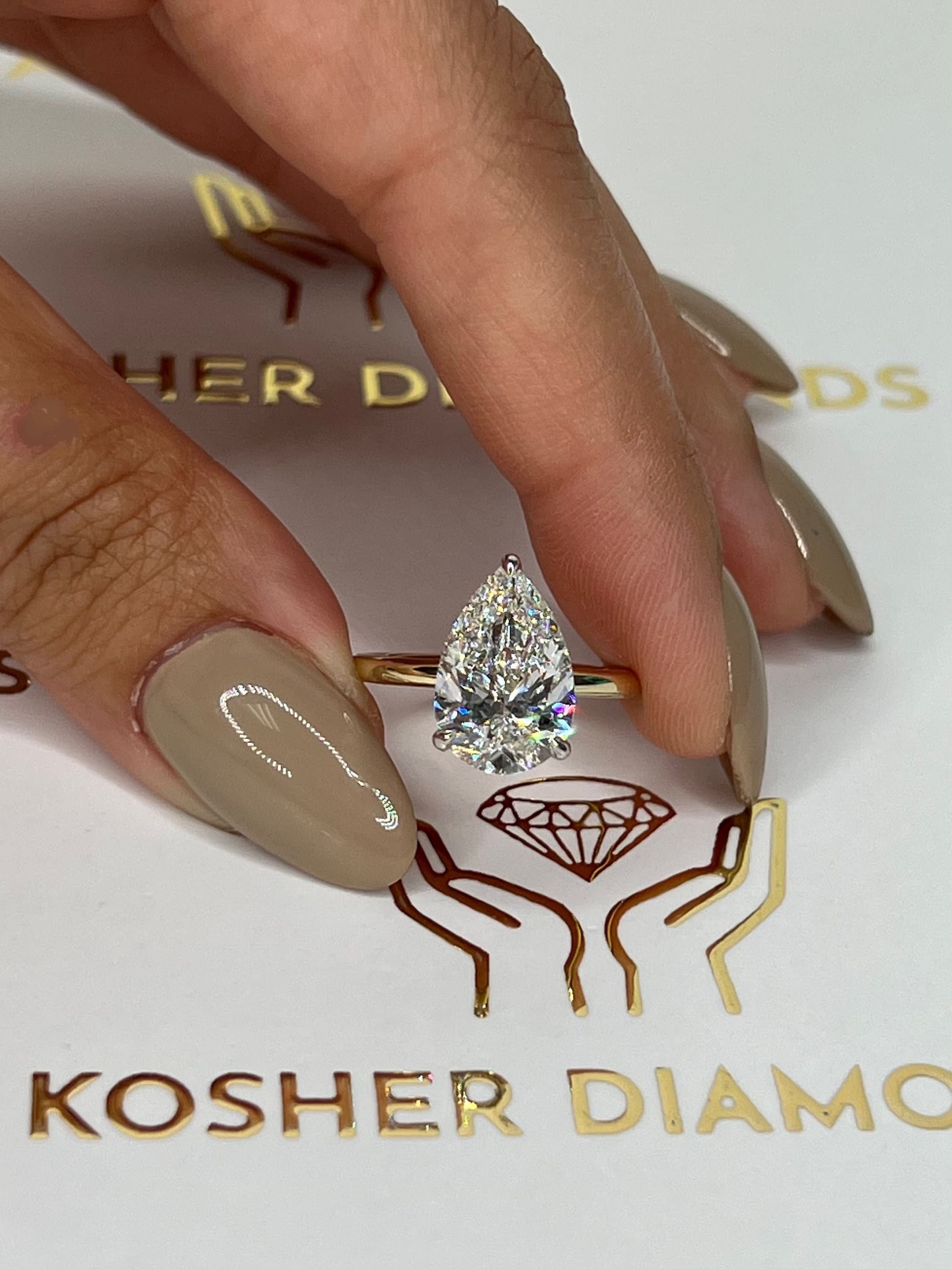 4 Carat Pear Cut Solitaire Diamond Engagement Ring, 3 prongs