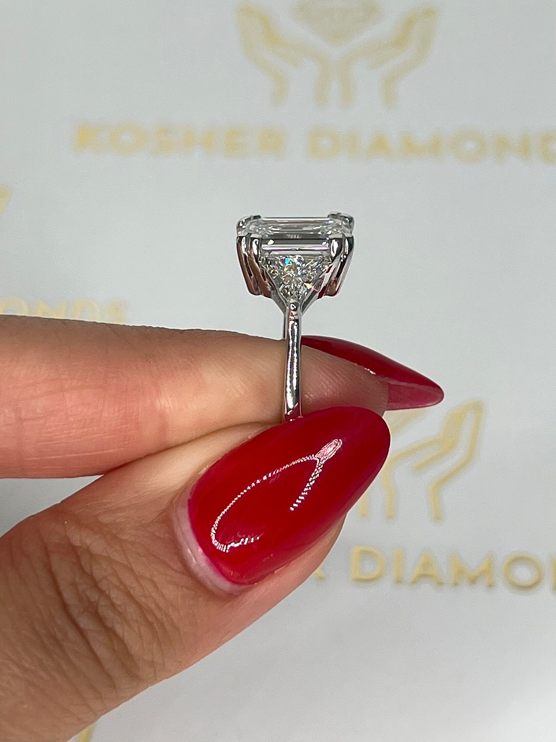 6 Carat Three Stone Emerald Cut Diamond Engagement Ring, Side Trillion Cut Diamonds