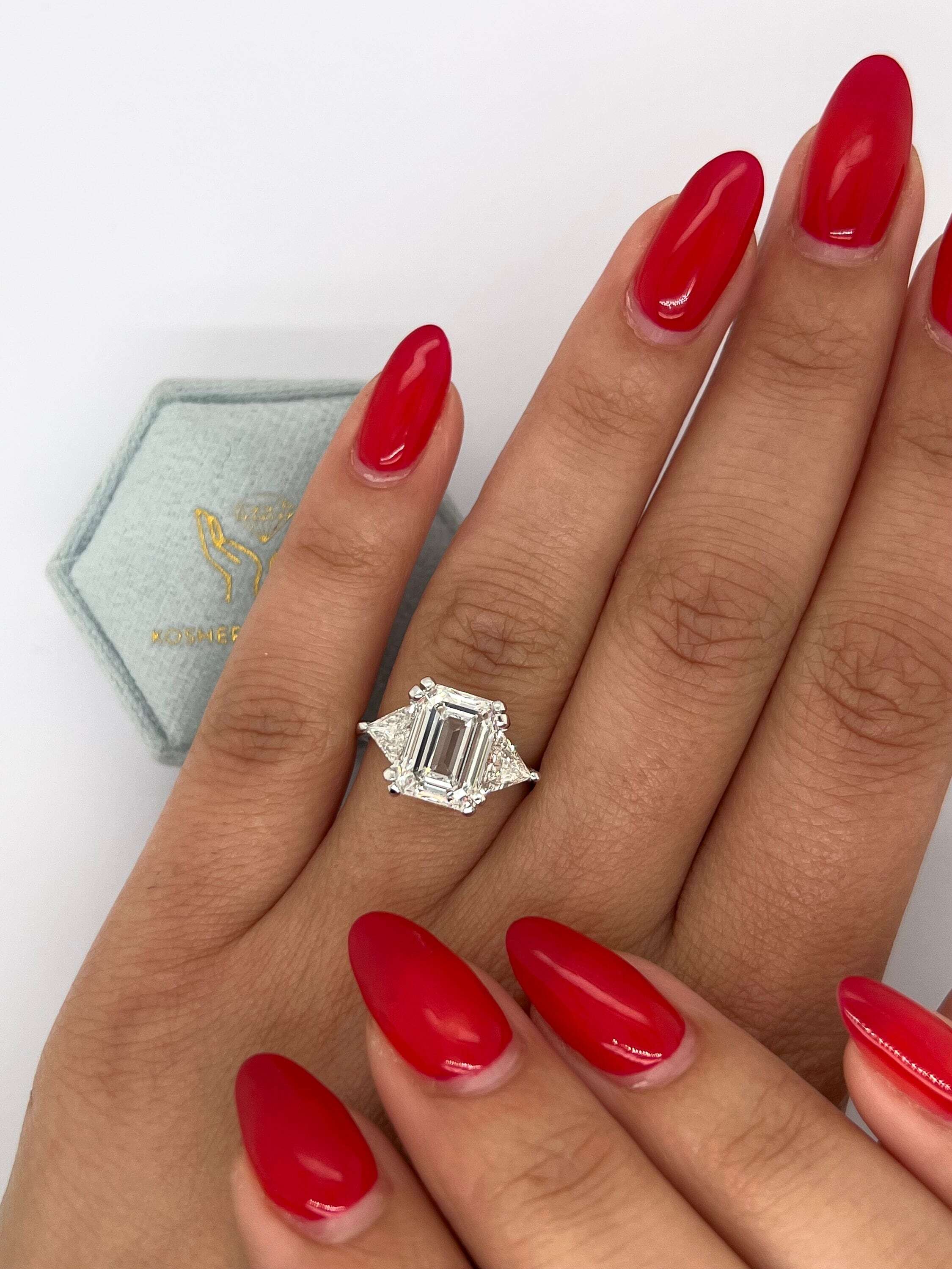 6 Carat Three Stone Emerald Cut Diamond Engagement Ring, Side Trillion Cut Diamonds
