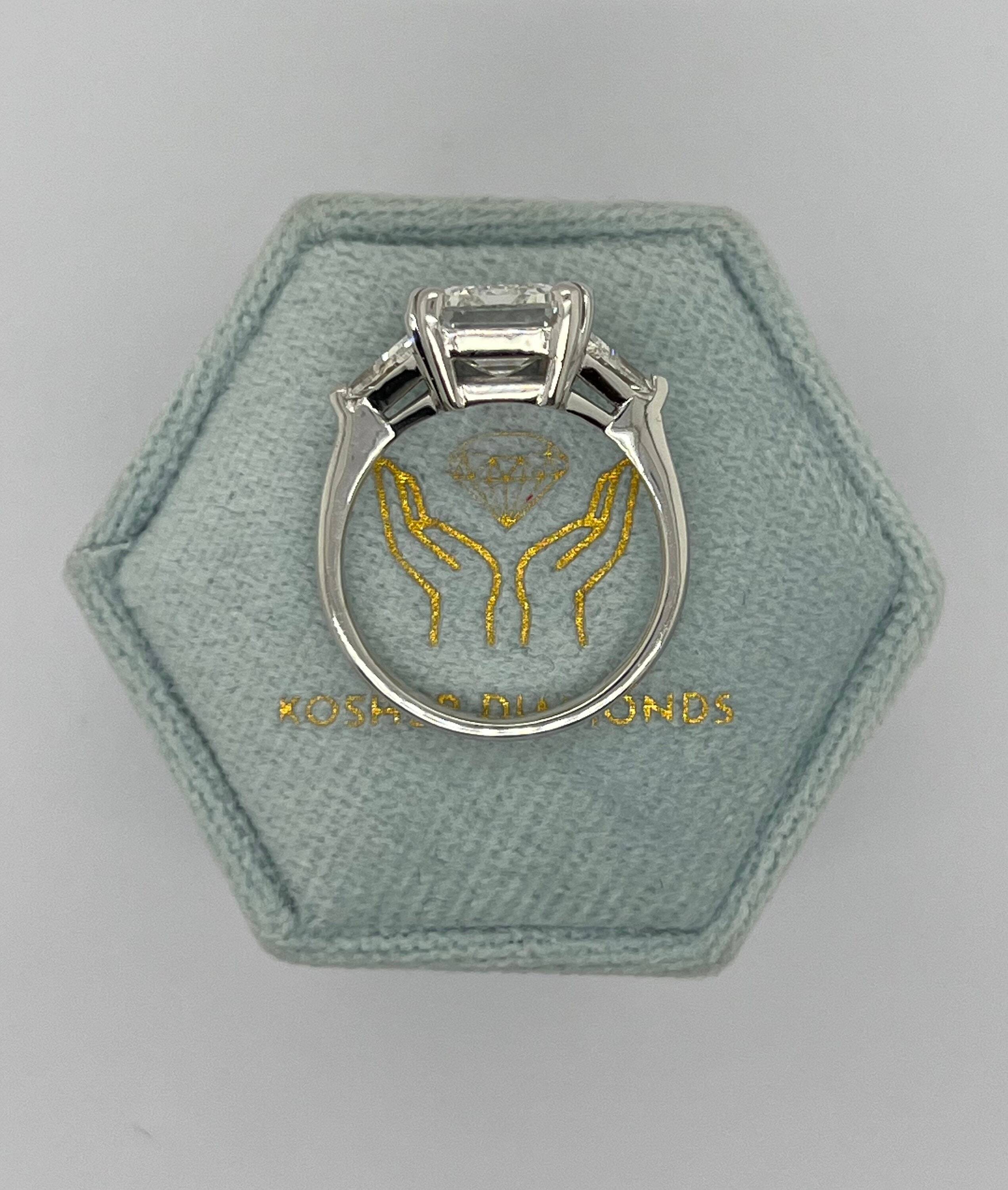 6 Carat Three Stone Emerald Cut Diamond Engagement Ring, Side Trillion Cut Diamonds