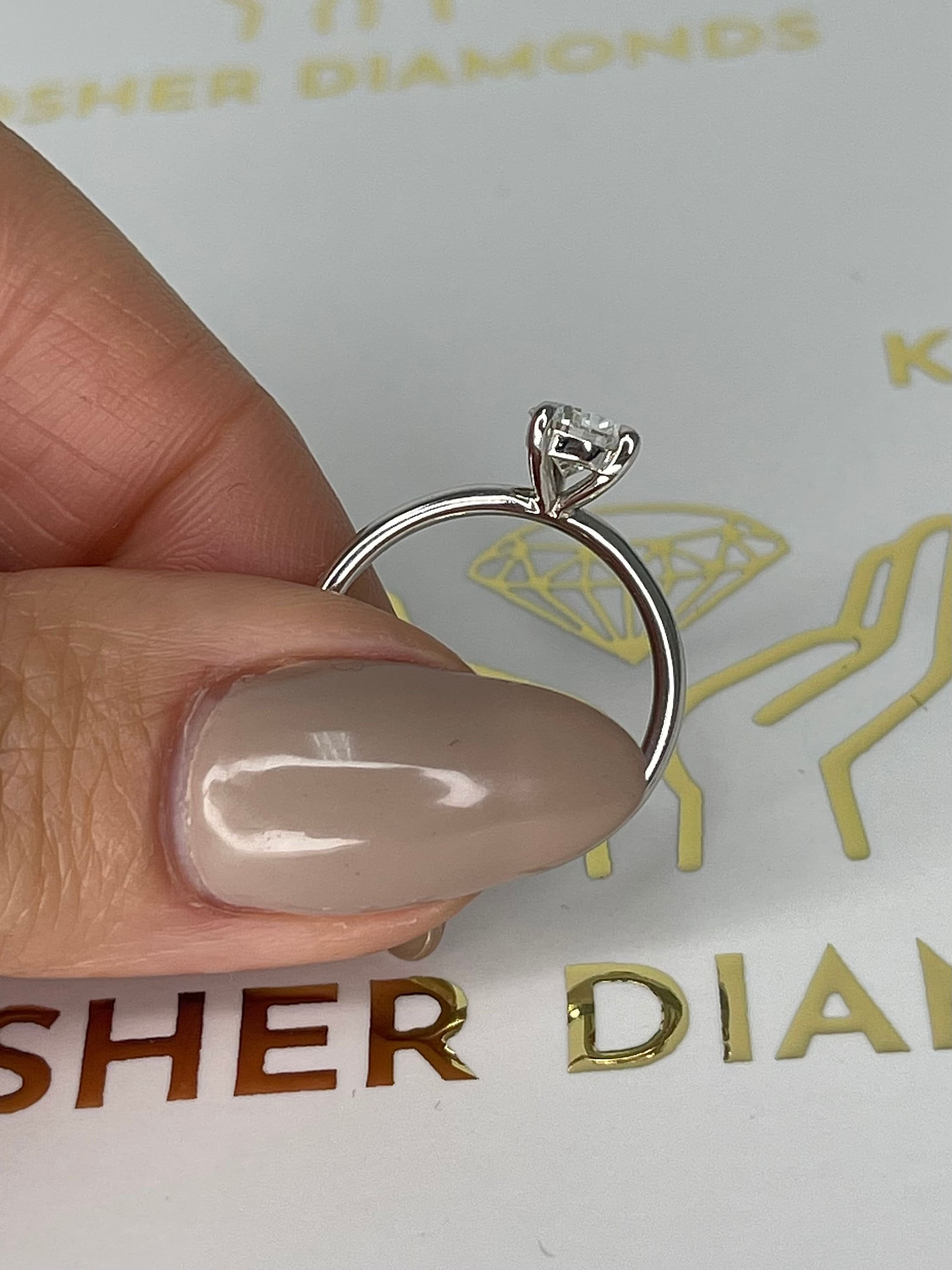1 Carat Pear Cut Solitaire Diamond Engagement Ring