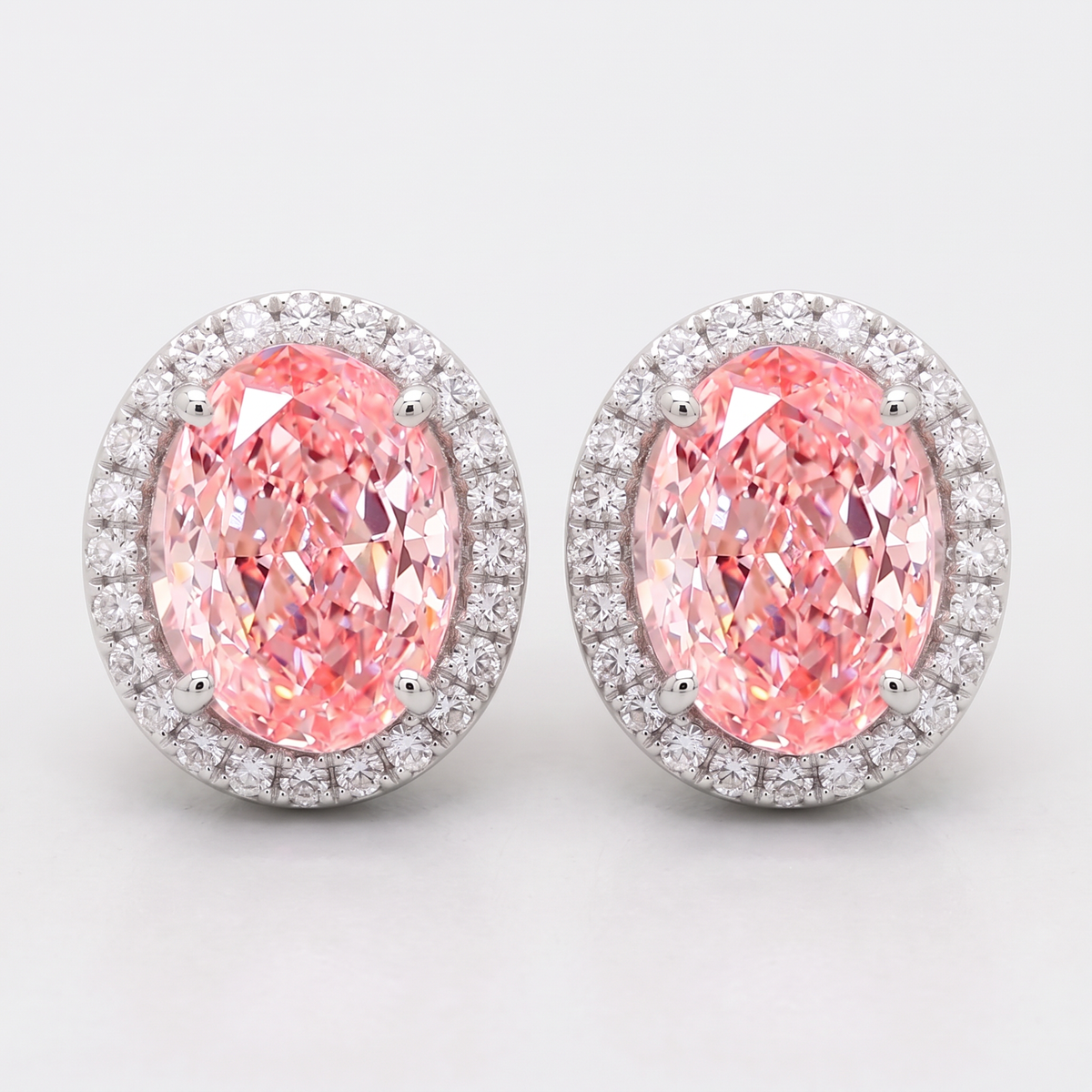 4.30 Carat Total Vivid Pink Oval Cut Diamond Halo Earrings